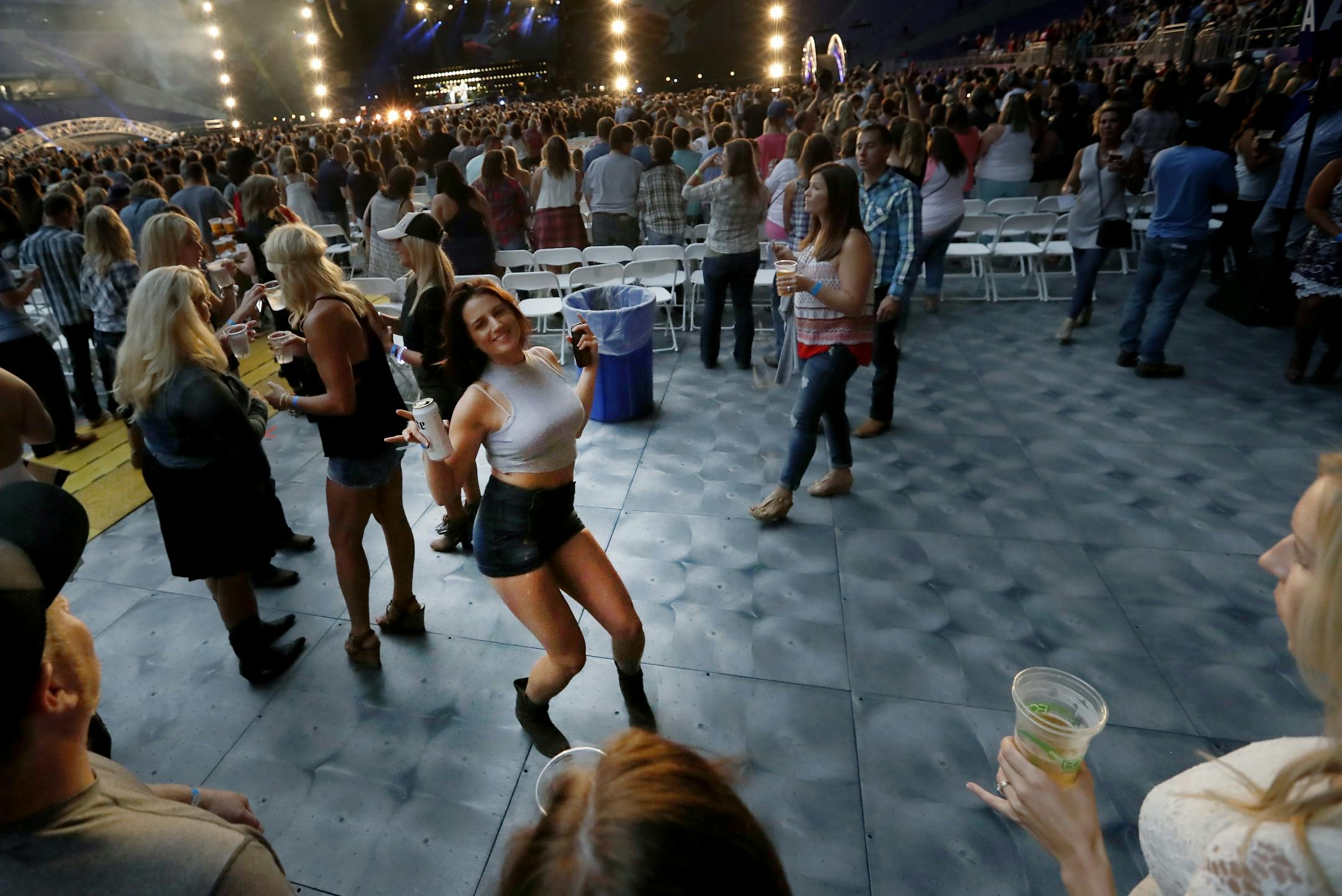 A fan danced to "Pontoon" as Little Big Town performed at US Bank Stadium.