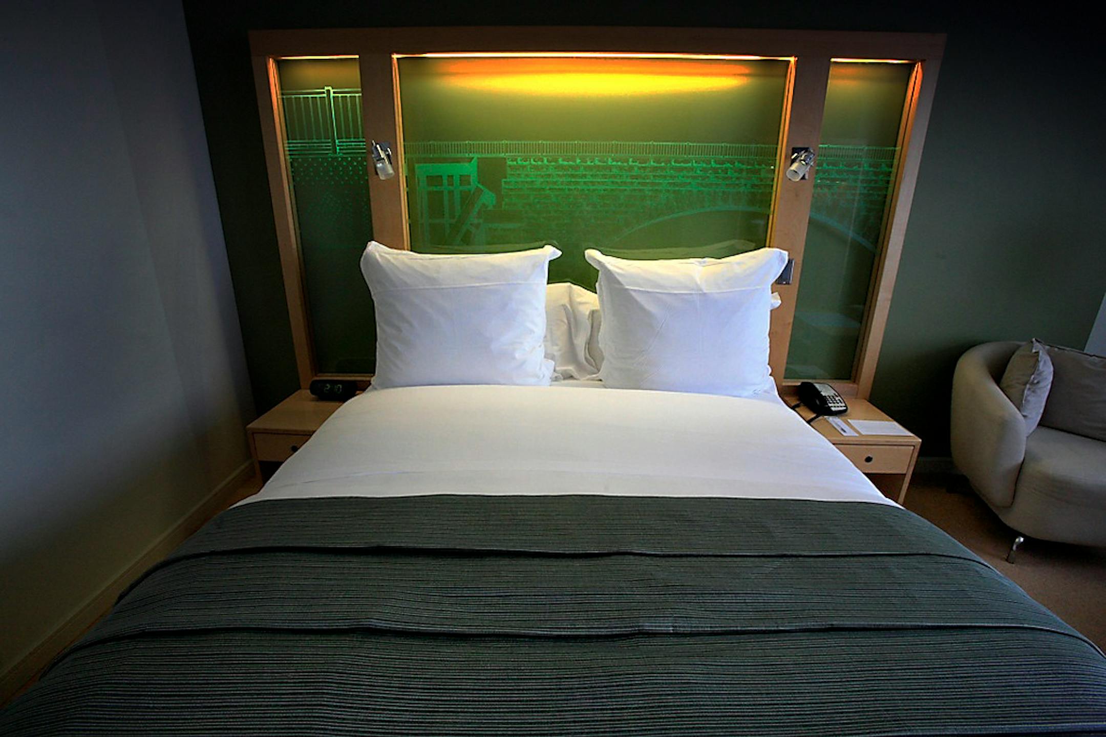 Cityscape glass etchings on the headboard, personal reading lights and beds that customers occasionally purchase are part of the Graves 601 experience.