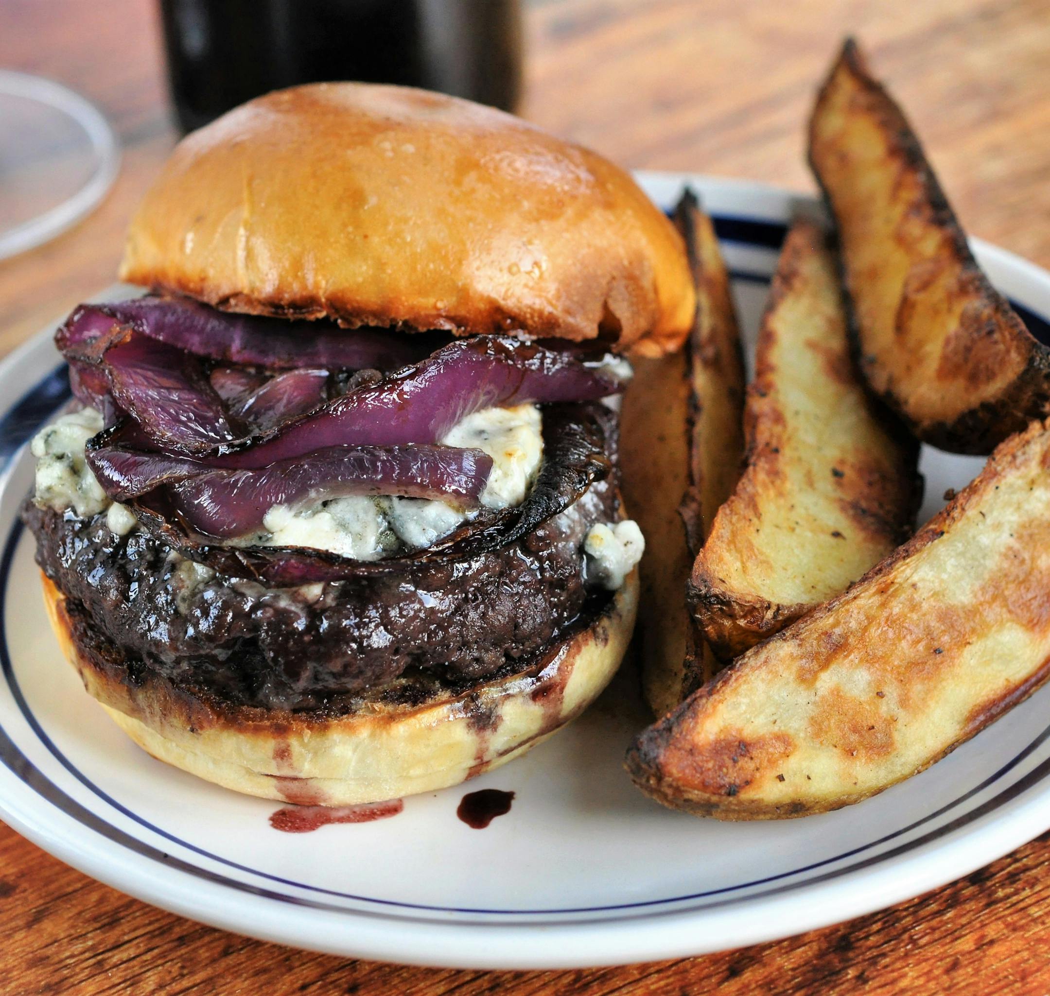 Sheet-Pan Red Wine and Blue Cheese Burgers With Roasted Wedge Fries. Photo by Meredith Deeds * Special to the Star Tribune