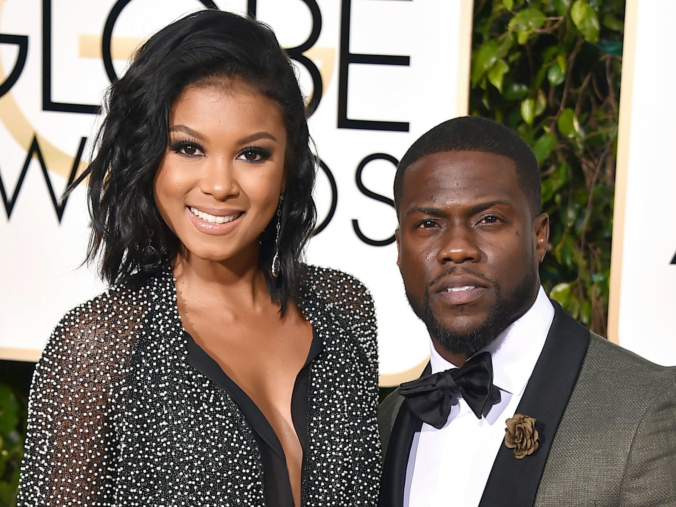 FILE - In this Jan. 10, 2016, file photo, Eniko Parrish, left, and Kevin Hart arrive at the 73rd annual Golden Globe Awards in Beverly Hills, Calif. The couple were wed in a lavish ceremony near Santa Barbara, Calif. on Saturday, Aug. 13. (Photo by Jordan Strauss/Invision/AP, File)