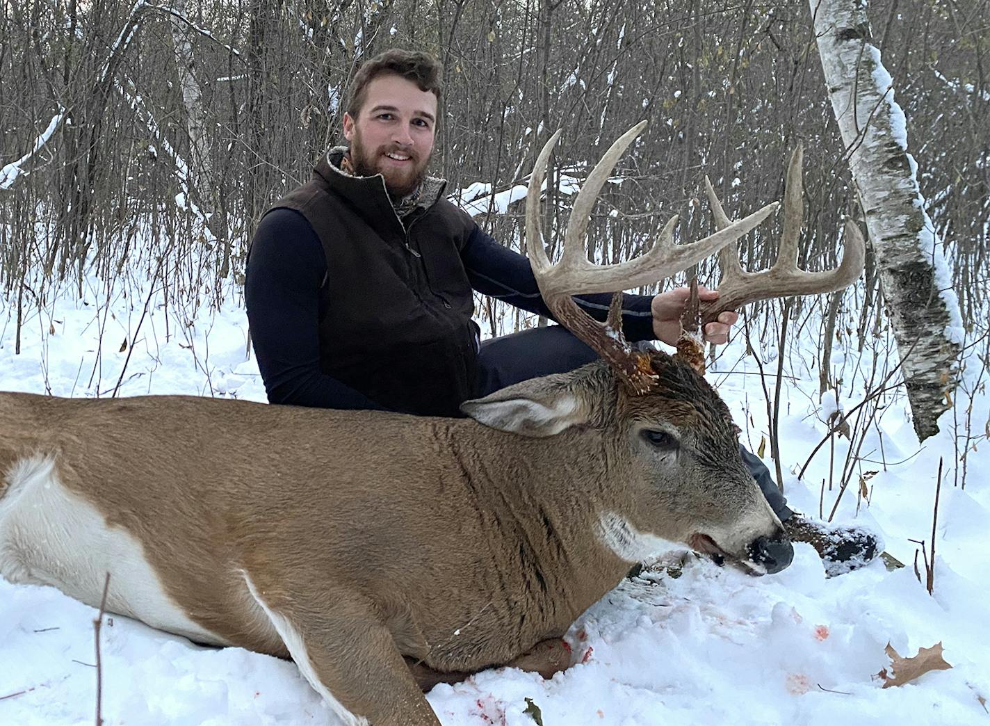 Zach Fuecker, 23, of Sauk Rapids missed this 11-point buck on an archery hunt prior to gun season. But the deer returned about 4 p.m. last Friday when Zach was carrying a rifle in the same open tree stand. Zach and his friend, Eric Burski, have been hunting on the same private land near Rice since they were 14 years old.