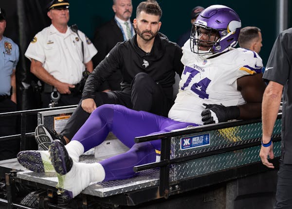 Minnesota Vikings offensive lineman Olisaemeka Udoh (74) is carted off the field Thursday, September 14, 2023, Lincoln Financial Field in Philadelphia