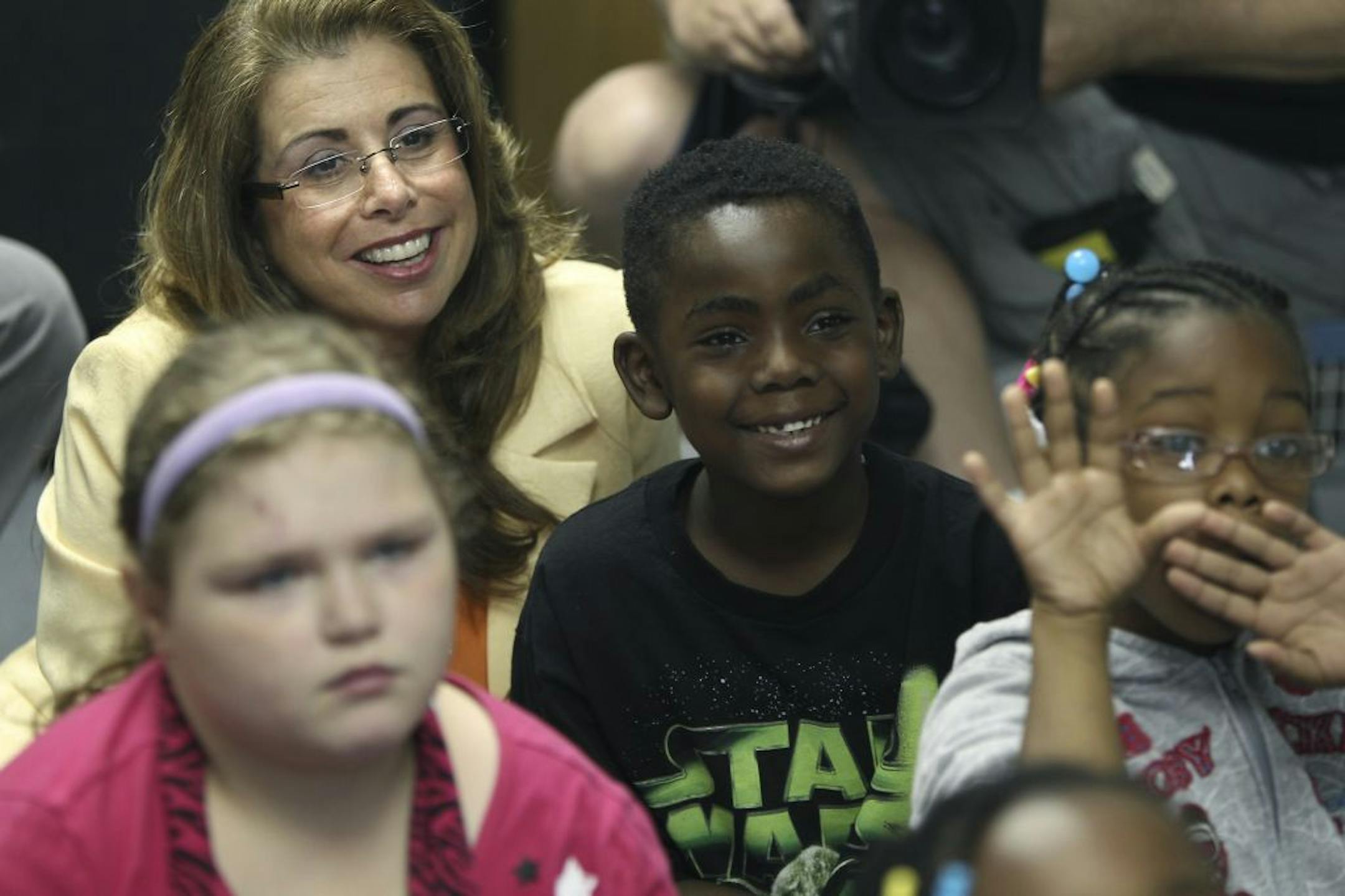 ELIZABETH FLORES � eflores@startribune.com St. Paul Superintendent Valeria Silva joined Dayton's Bluff Elementary students as Minnesota Senator Al Franken, and Arnie Duncan, the United States Secretary of Education, read a book in their classroom in St. Paul, Minn., on Tuesday, May 31, 2011. The Secretary participated in a roundtable discussion with Sen. Al Franken and local education stakeholders regarding reauthorizing the Elementary and Secondary Education Act.