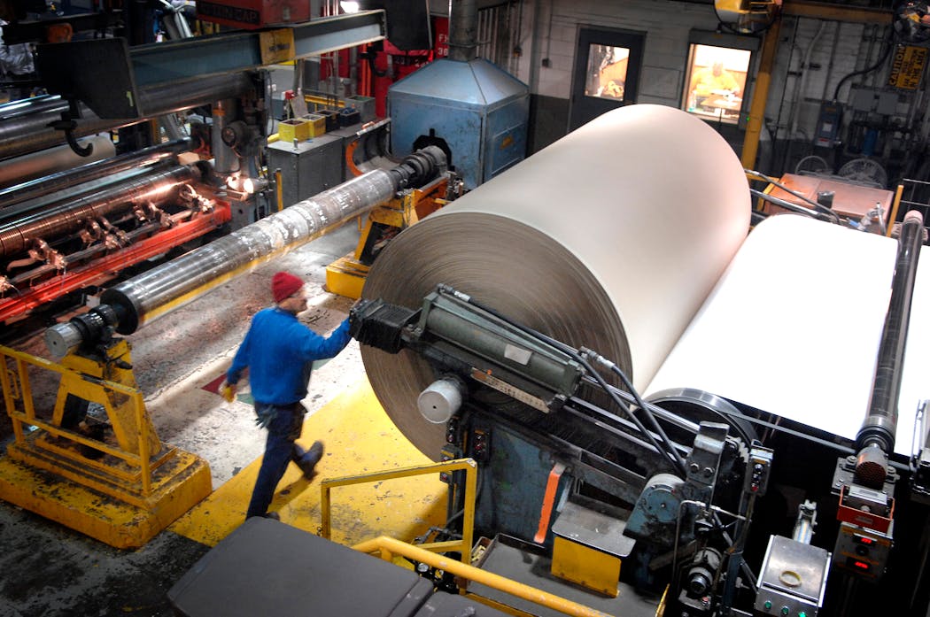 Workers at the WestRock plant in St. Paul produced a a 7-ton roll of 100 percent recycled clay-coated paperboard in 2008.