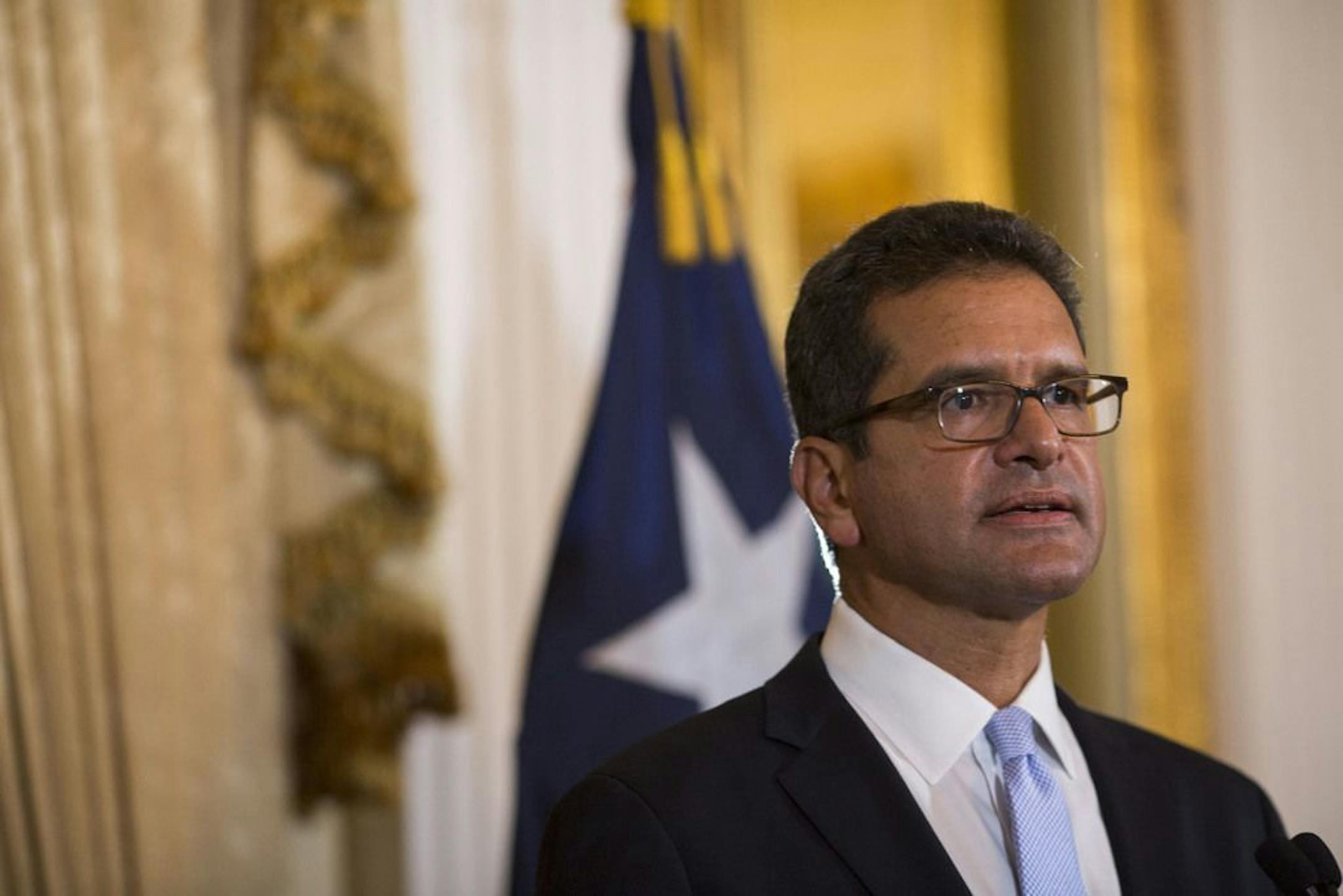 Pedro Pierluisi, sworn in as Puerto Rico's governor, attends a press conference in San Juan, Puerto Rico, Friday, Aug. 2, 2019. Departing Puerto Rico Gov. Ricardo Rossello resigned as promised on Friday and swore in Pierluisi, a veteran politician as his replacement, a move certain to throw the U.S. territory into a period of political chaos that will be fought out in court.