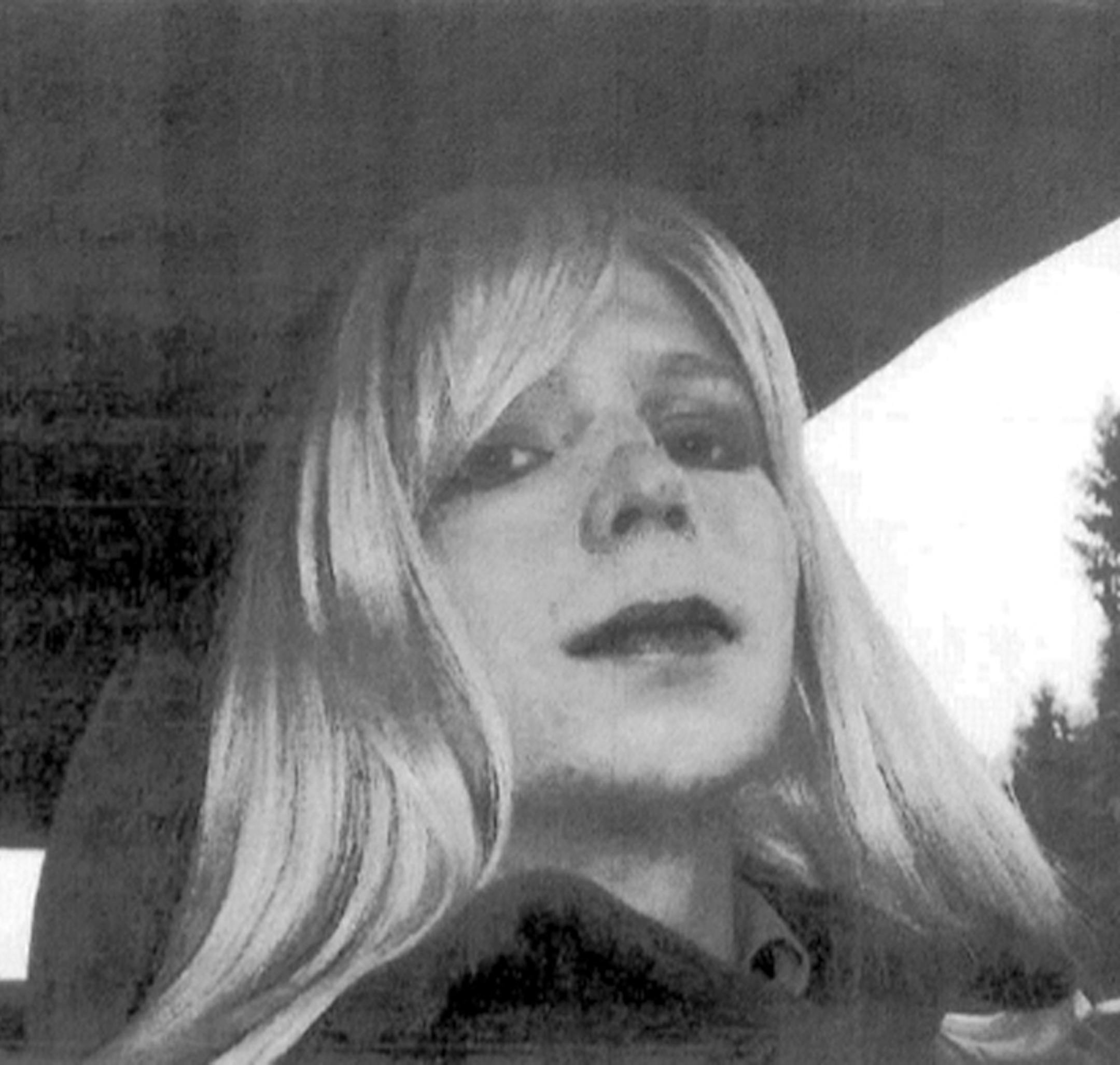 In this undated photo provided by the U.S. Army, Pfc. Bradley Manning poses for a photo wearing a wig and lipstick. Manning†emailed his military†therapist the photo with a letter titled, "My problem," in which he described his issues with gender identity and his hope that a military career would "get rid of it." (AP Photo/U.S. Army)