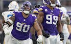 Minnesota Vikings defensive end Jonathan Bullard (90) makes a tackle for a turnover on downs during the fourth quarter.