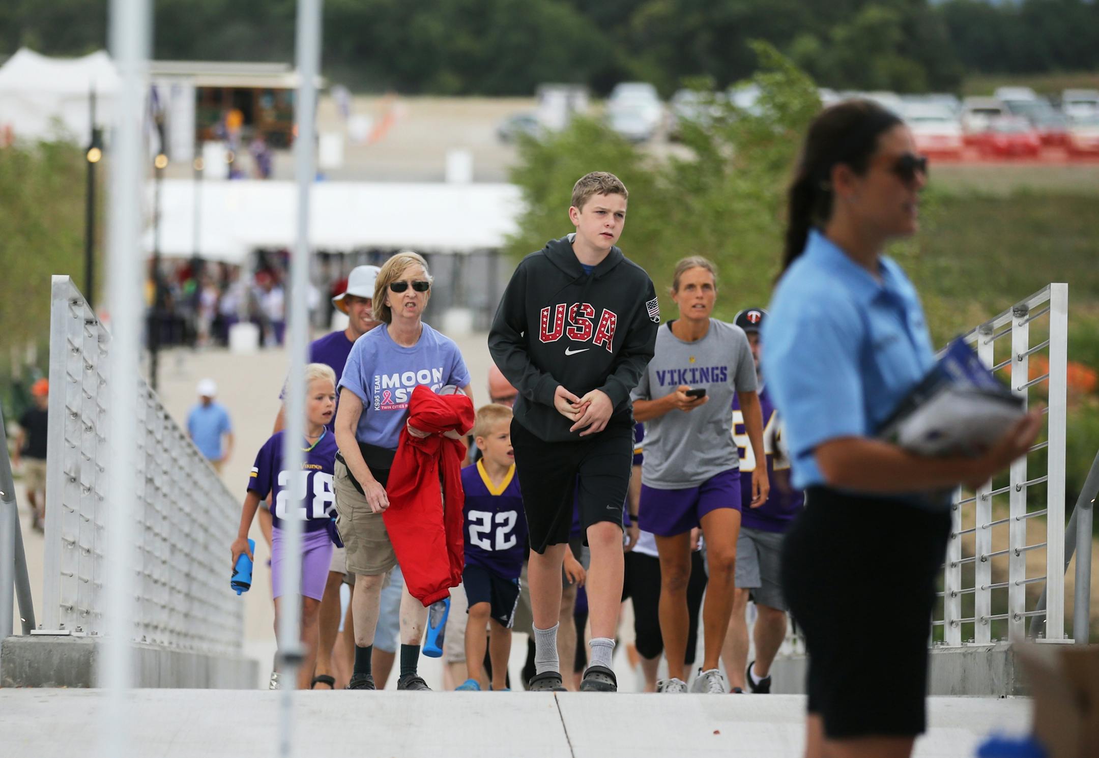 Minnesota Vikings fans arrive before the start of a Vikings and Jacksonville Jaguars joint practice session Thursday, Aug. 16, 2018, at the TCO Performance Center in Eagan, MN.