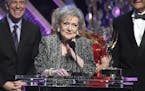 Betty White accepts the lifetime achievement award at the 42nd annual Daytime Emmy Awards at Warner Bros. Studios on Sunday, April 26, 2015, in Burban