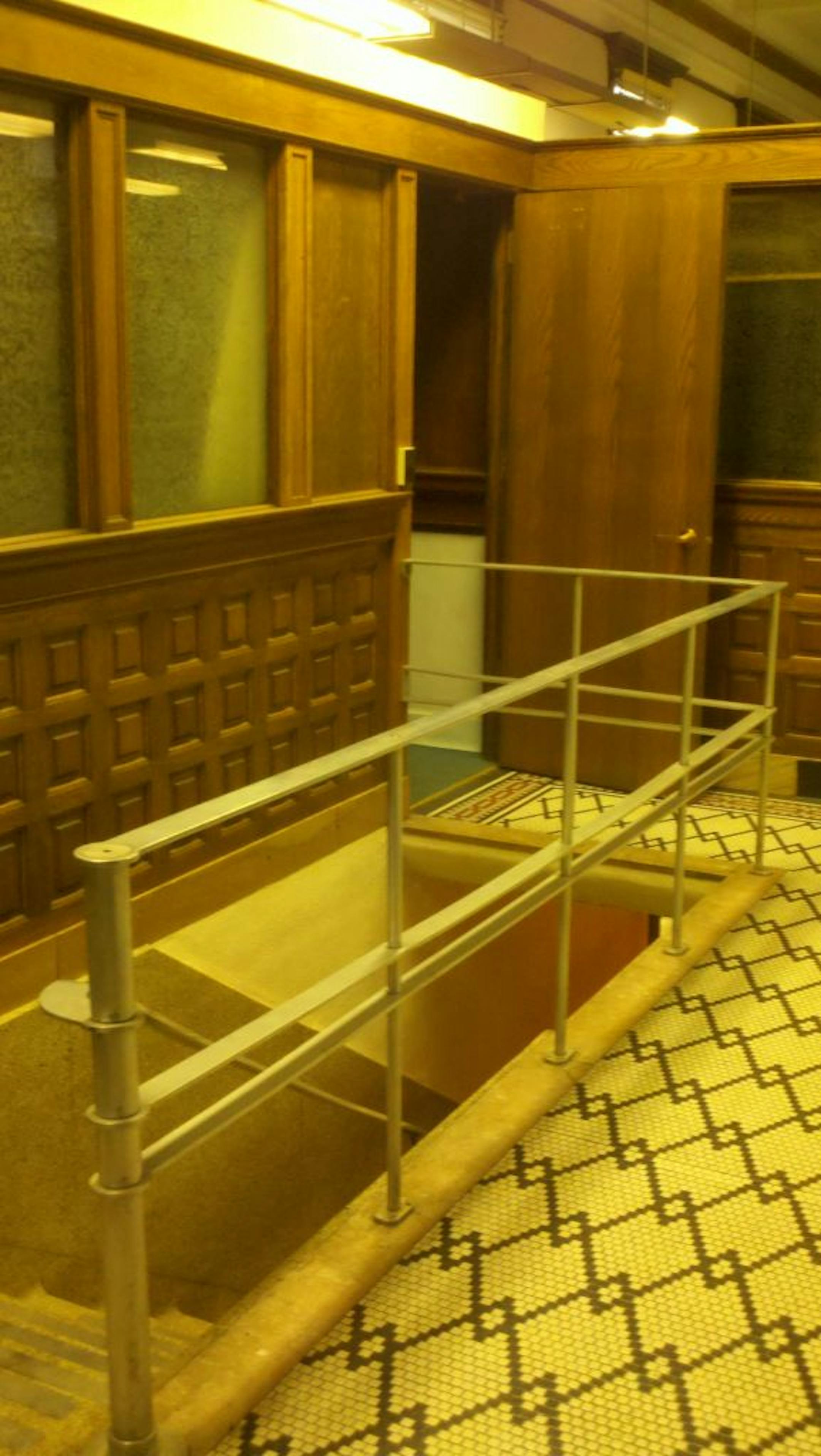 The building's interior includes extensive woodwork and ornamental tiles.