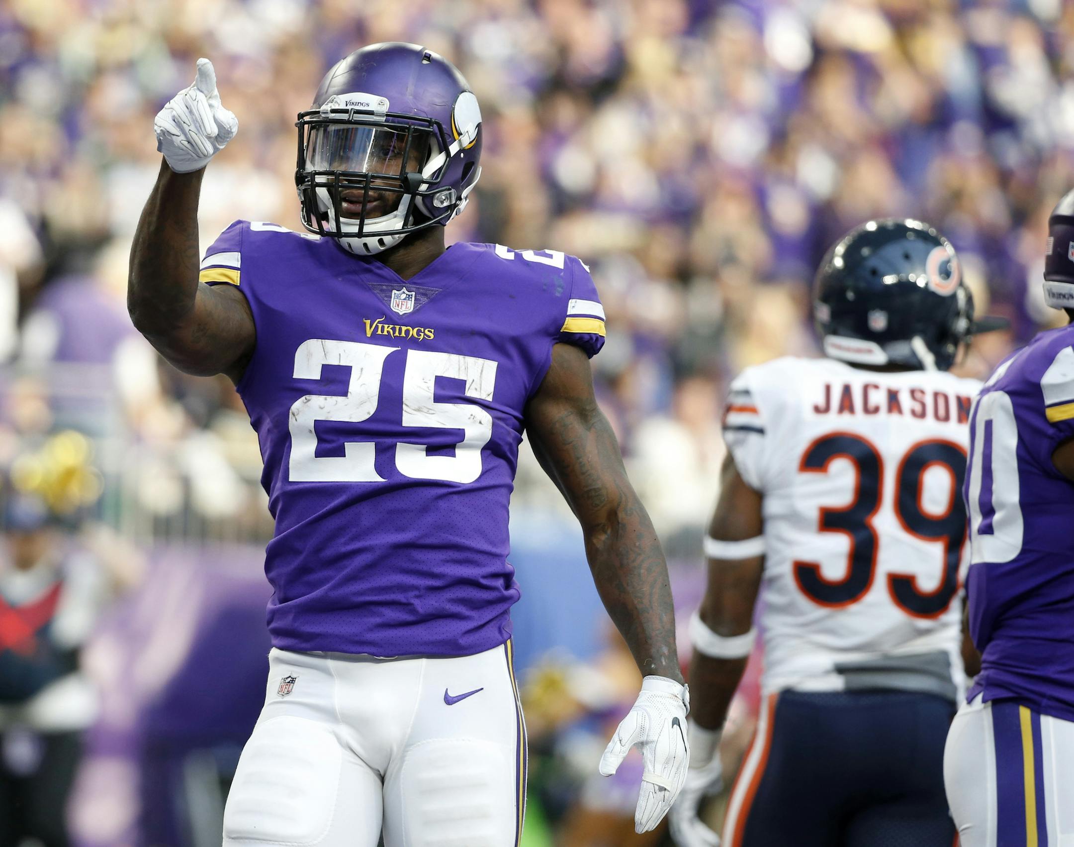 Minnesota Vikings running back Latavius Murray celebrates after scoring on a 1-yard touchdown run during the first half of an NFL football game against the Chicago Bears, Sunday, Dec. 31, 2017, in Minneapolis. (AP Photo/Bruce Kluckhohn)
