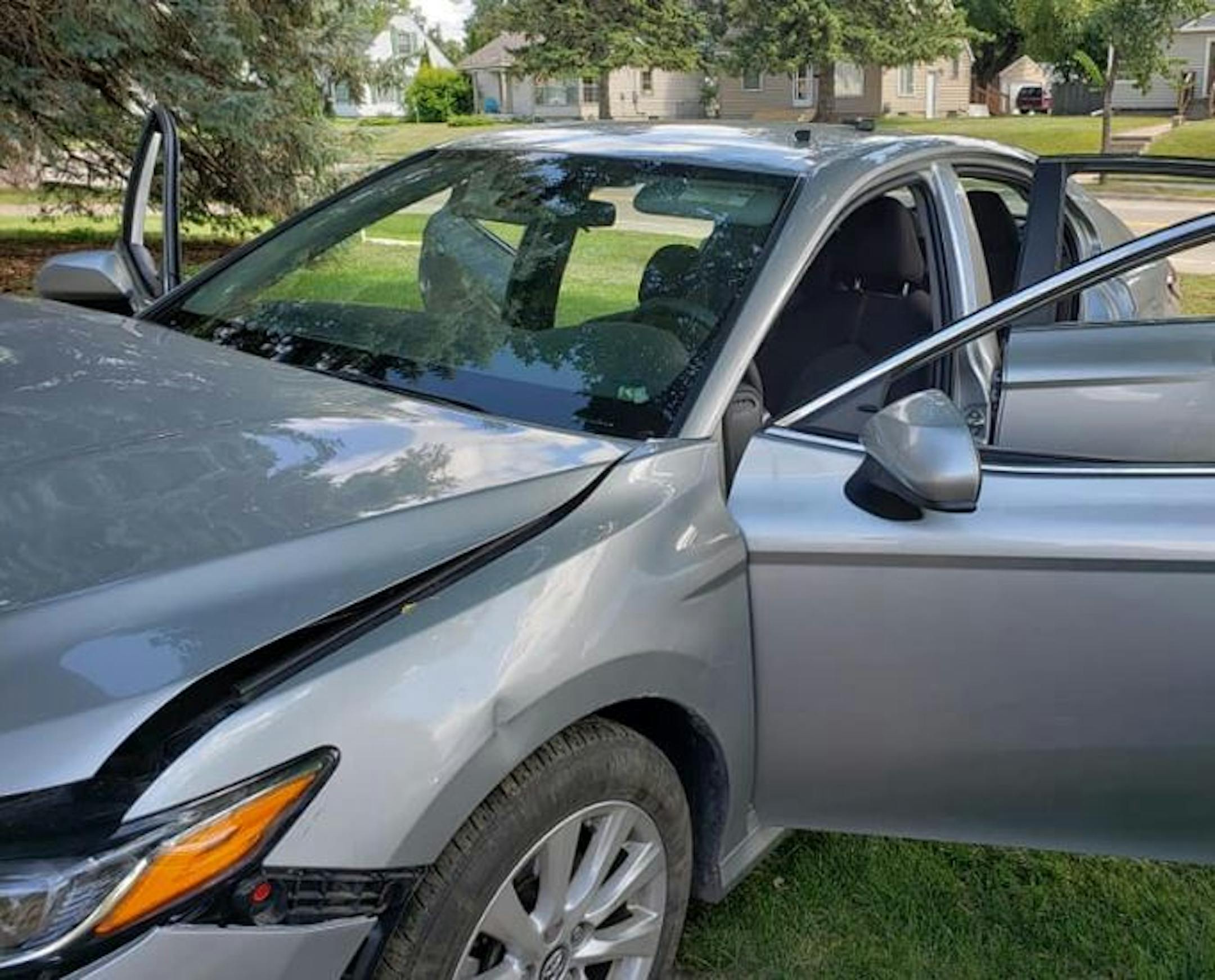 A New Brighton police officer was injured while stuck to this car as it hit a building. Credit: New Brighton Police Department