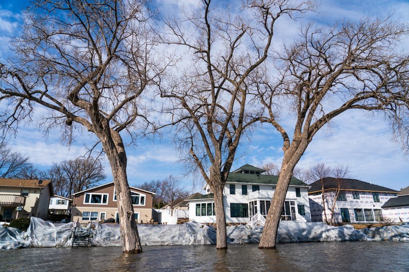 Lakefront homeowners have shored up their seawalls with plastic in Lake City.