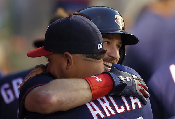 The Twins&#x2019; Trevor Plouffe was congratulated by Oswaldo Arcia after hitting a three-run homer during the third inning against the Angels on Mond