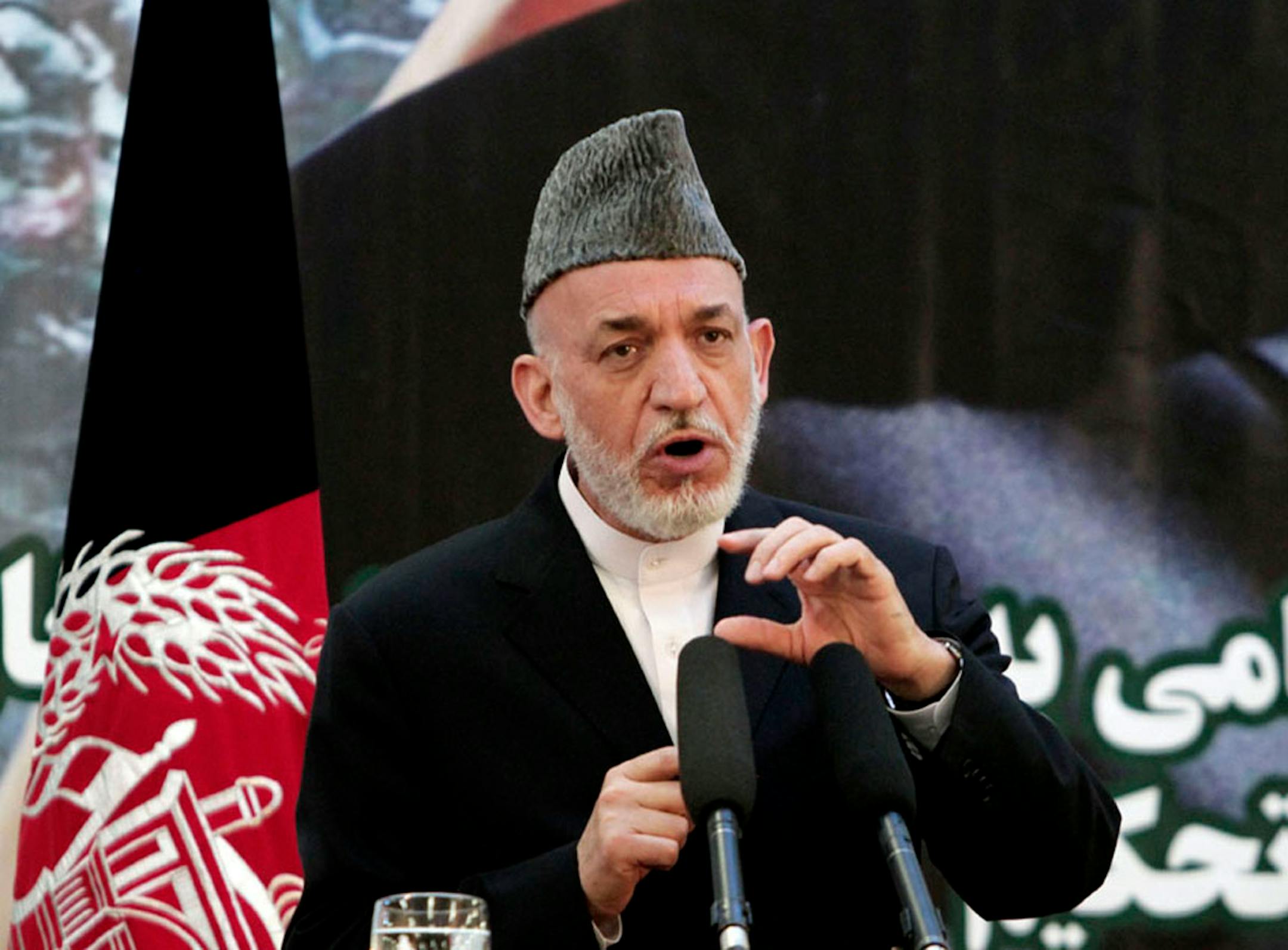 Afghan President Hamid Karzai speaks at a press conference during a ceremony at a military academy on the outskirts of Kabul, Afghanistan.