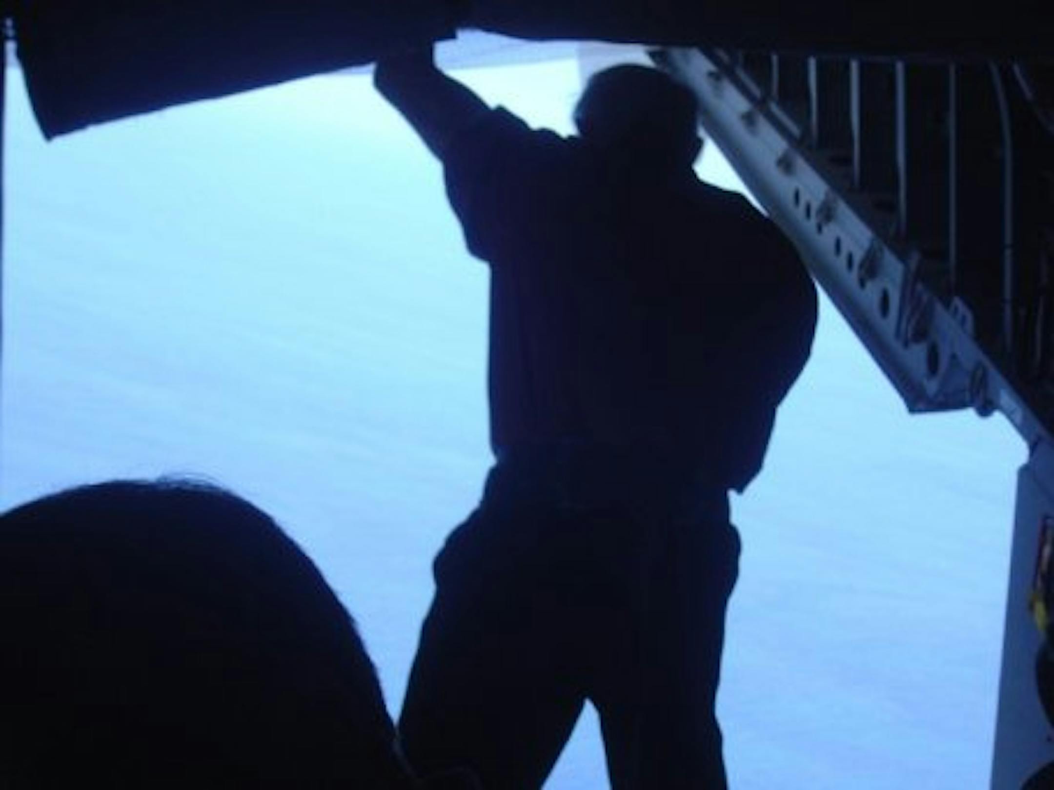 Oberstar flying over the Gulf Oil spill in a military plane