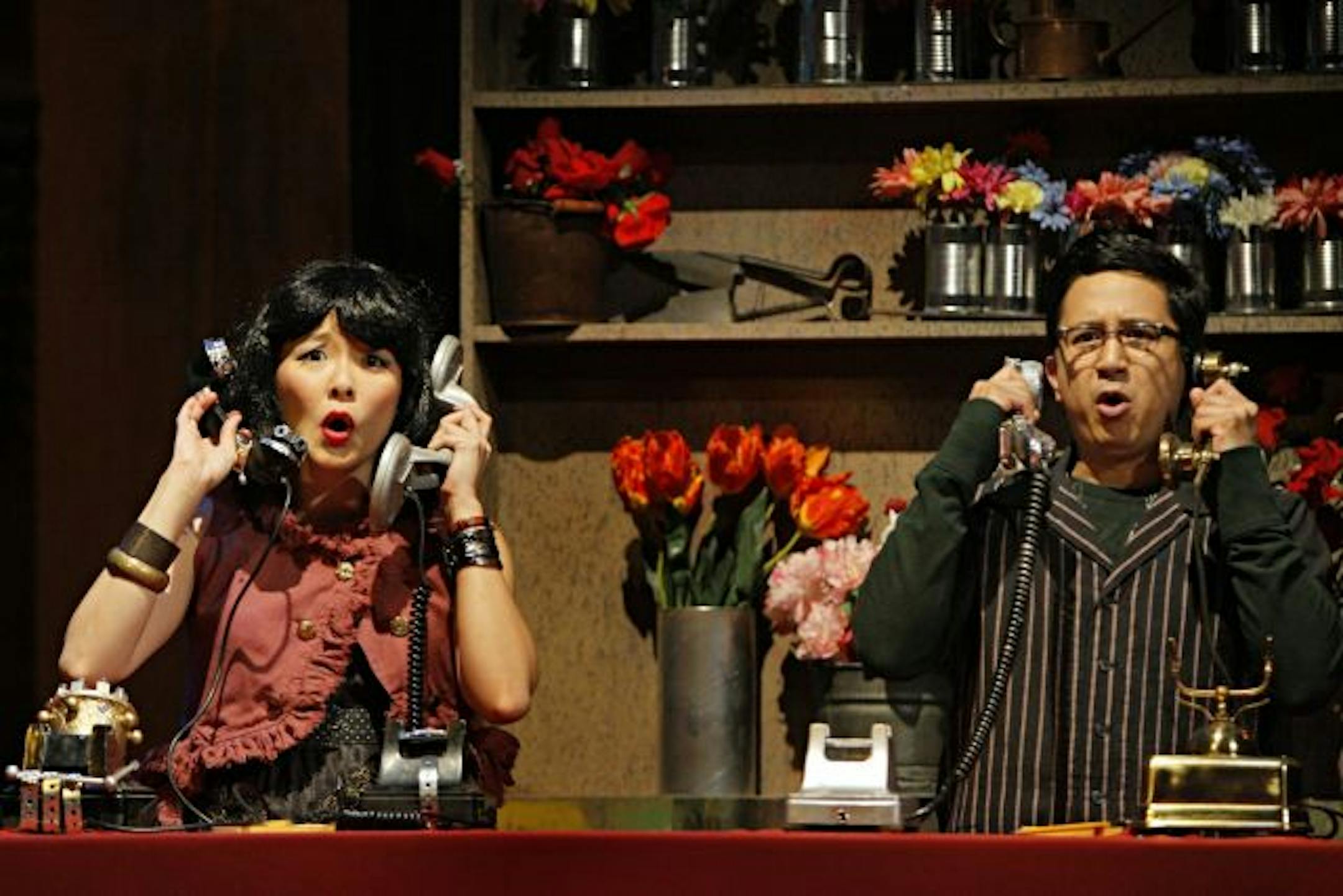Sara Ochs as Audrey and Randy Reyes as Seymour in the Mu Performing Arts production of "Little Shop of Horrors."