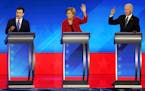 From left, Democratic presidential candidates former South Bend, Ind., Mayor Pete Buttigieg, Sen. Elizabeth Warren (D-Mass.) and former Vice President