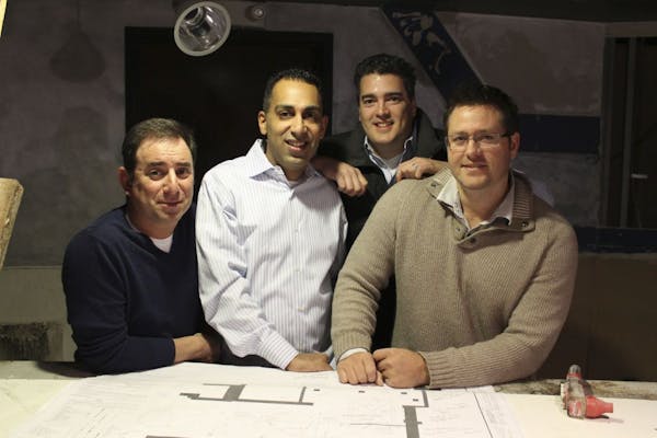 Owners of The Pourhouse. from left: Jay Ettinger, Deepak Nath, Jacob Toledo and Brent Frederick. Photo by Tom Horgen.