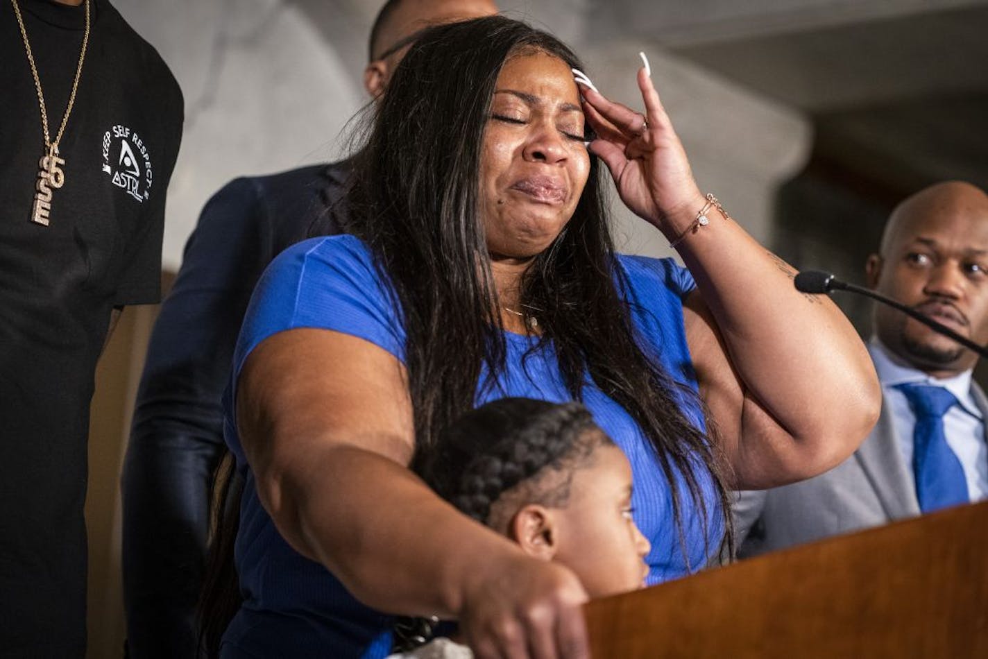 Roxie Washington, the mother of George Floyd's six-year-old daughter Gianna Floyd, got emotional during a press conference at Minneapolis City Hall.