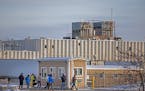 Workers make their way out of the Long Prairie Packing Company in Long Prairie, Minn., on Tuesday, Jan. 16, 2024. ] Elizabeth Flores • liz.flores@st