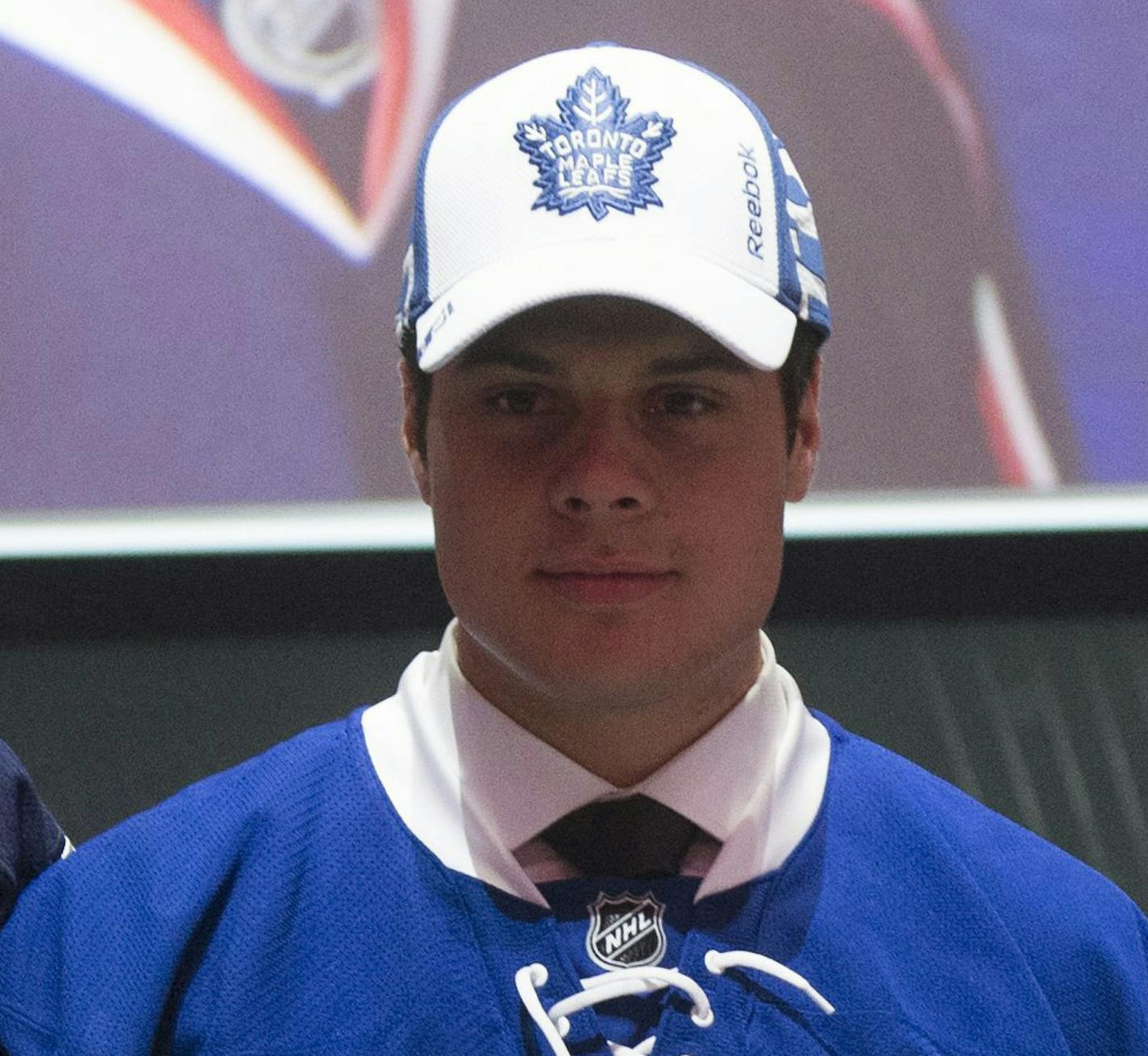 The NHL top three draft picks, Patrik Laine, Winnipeg Jets; Auston Matthews, Toronto Maple Leafs; and Pierre-Luc Dubois, Columbus Blue Jackets, pose for a photo at the NHL hockey draft, Friday, June 24, 2016, in Buffalo, N.Y. (Nathan Denette/The Canadian Press via AP) ORG XMIT: MIN2017061118401714