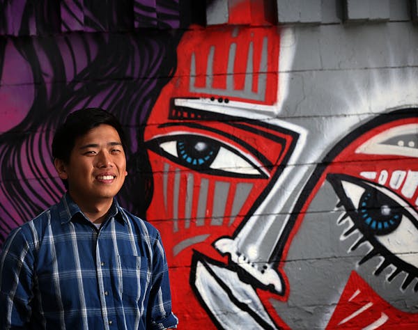 Poet Kevin Yang works with young artists at Intermedia Arts in Minneapolis. "The generation before us were explorers," he said. "We are creators." Wit