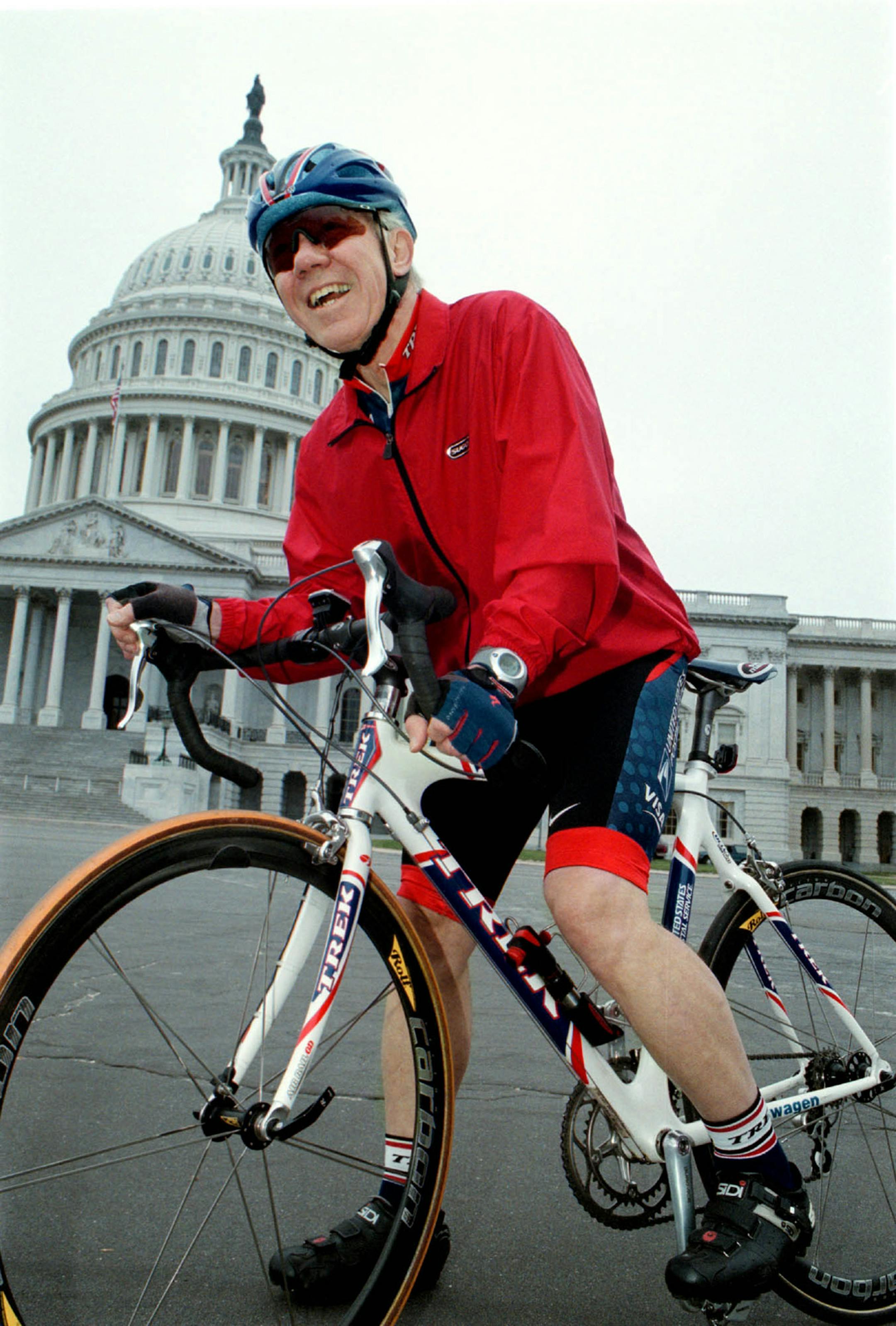 Congressman James Oberstar cycling around the US Capitol in Washington DC on hisTrek Tour de France 2000 racing bike which has a carbon fiber frame and graphite handlebars and seat post. April 12 2002. Photo: Melanie Burford