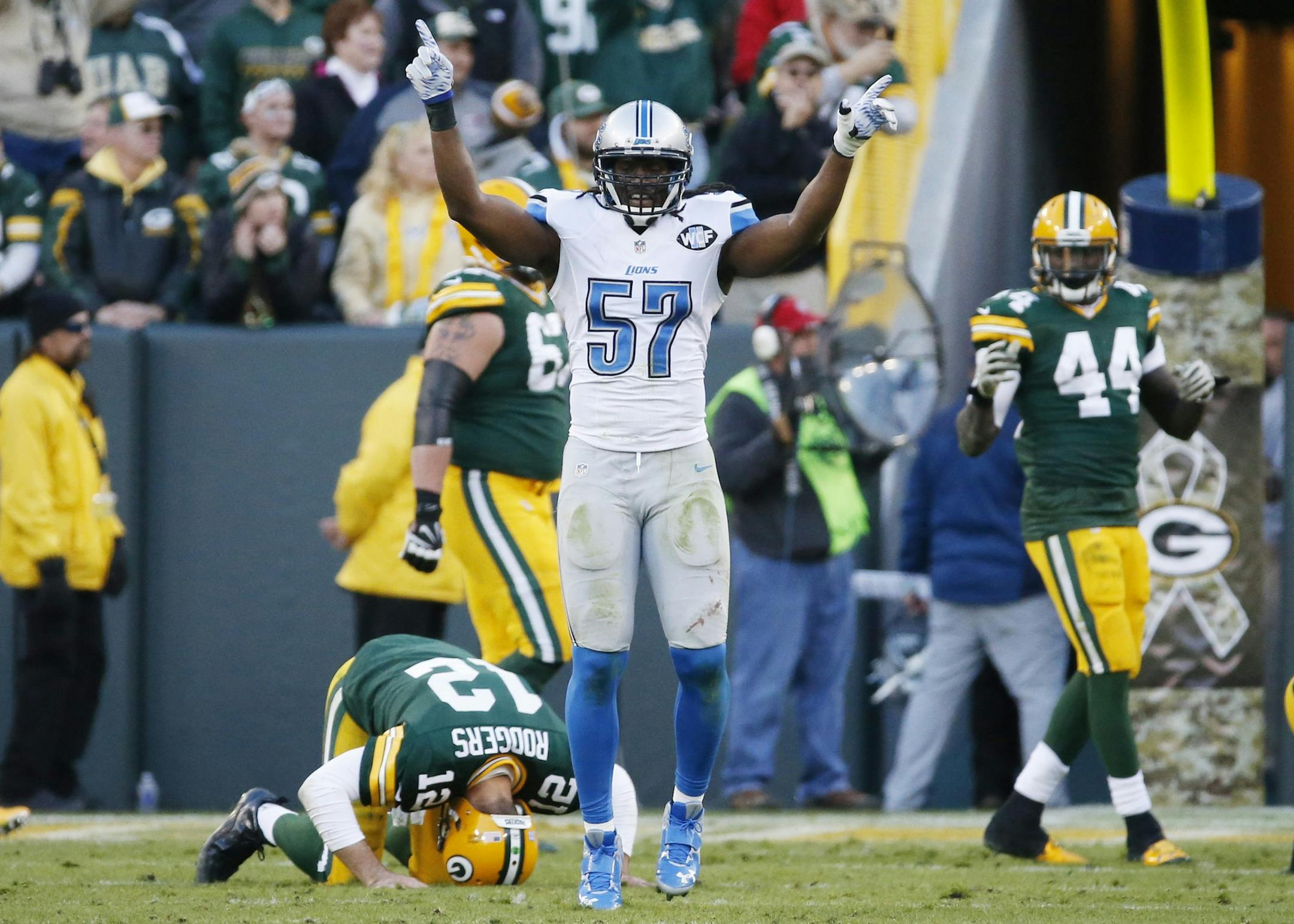 Detroit Lions' Josh Bynes celebrates after the Green Bay Packers failed to convert a two-point conversion during the second half of an NFL football game Sunday, Nov. 15, 2015, in Green Bay, Wis. The Lions won 18-16. (AP Photo/Mike Roemer)