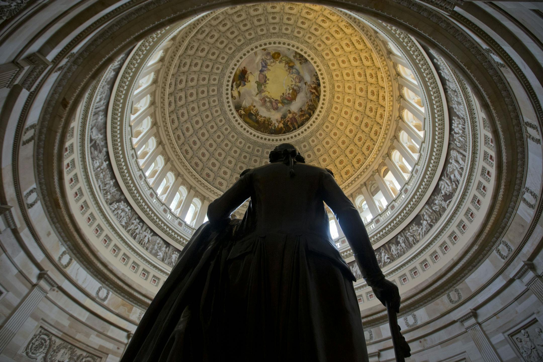 A statue of President George Washington in seen in the Capitol Rotunda on Capitol Hill in Washington, Tuesday, Jan. 28, 2014. President Barack Obama will give his State of the Union address tonight to a joint session of Congress.