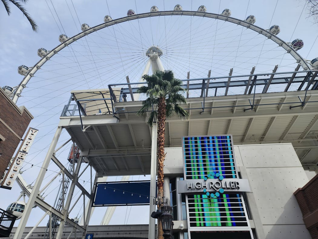 The High Roller Observation Wheel spins high above the Las Vegas Strip.
