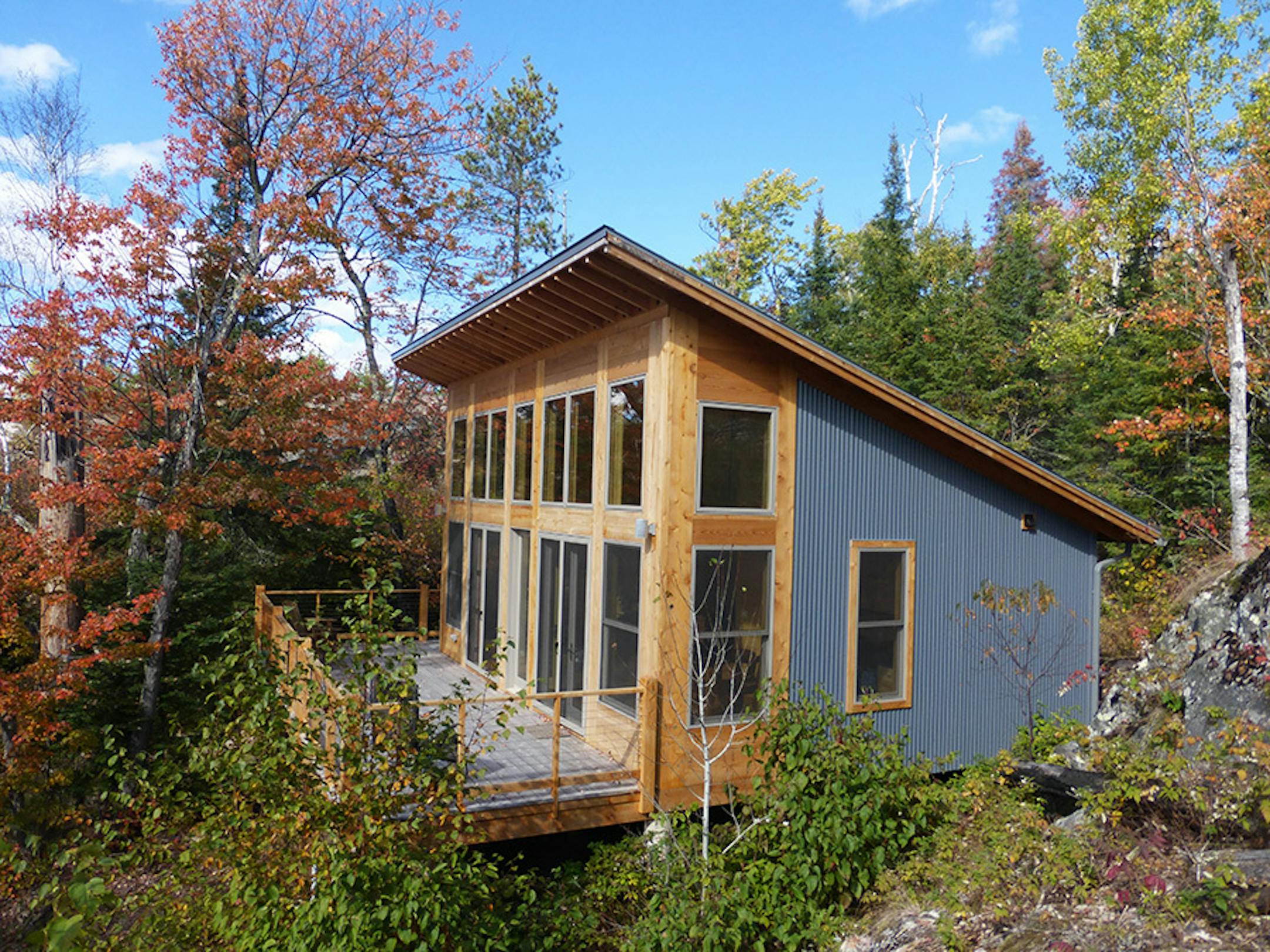 Ripple Island Cabin. Rustic one room cabin hat captures sunlight and views in northern Minnesota, by Ken Stone.