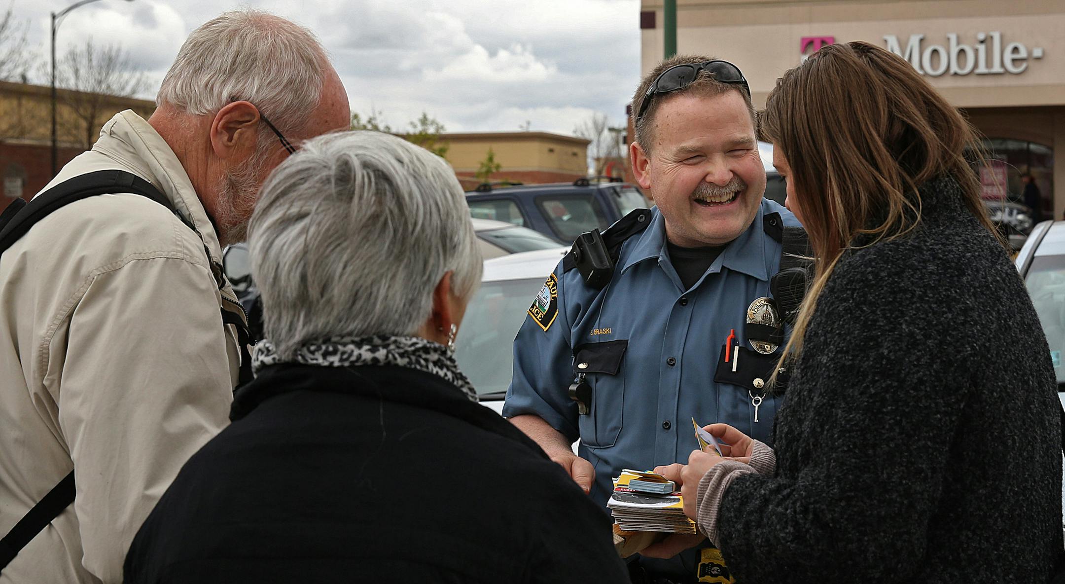 St. Paul Police officer Scott Braski patrolled an area in and around University Avenue, where the new Green Line light rail travels through St. Paul. Part of Braski‚Äôs duties included distributing informational materials that encourage safety to pedestrians and motorists around the Green Line, which opens to the public in June. ] JIM GEHRZ ‚Ä¢ jgehrz@startribune.com / Minneapolis, MN / May 15 , 2014 / 4:00 PM