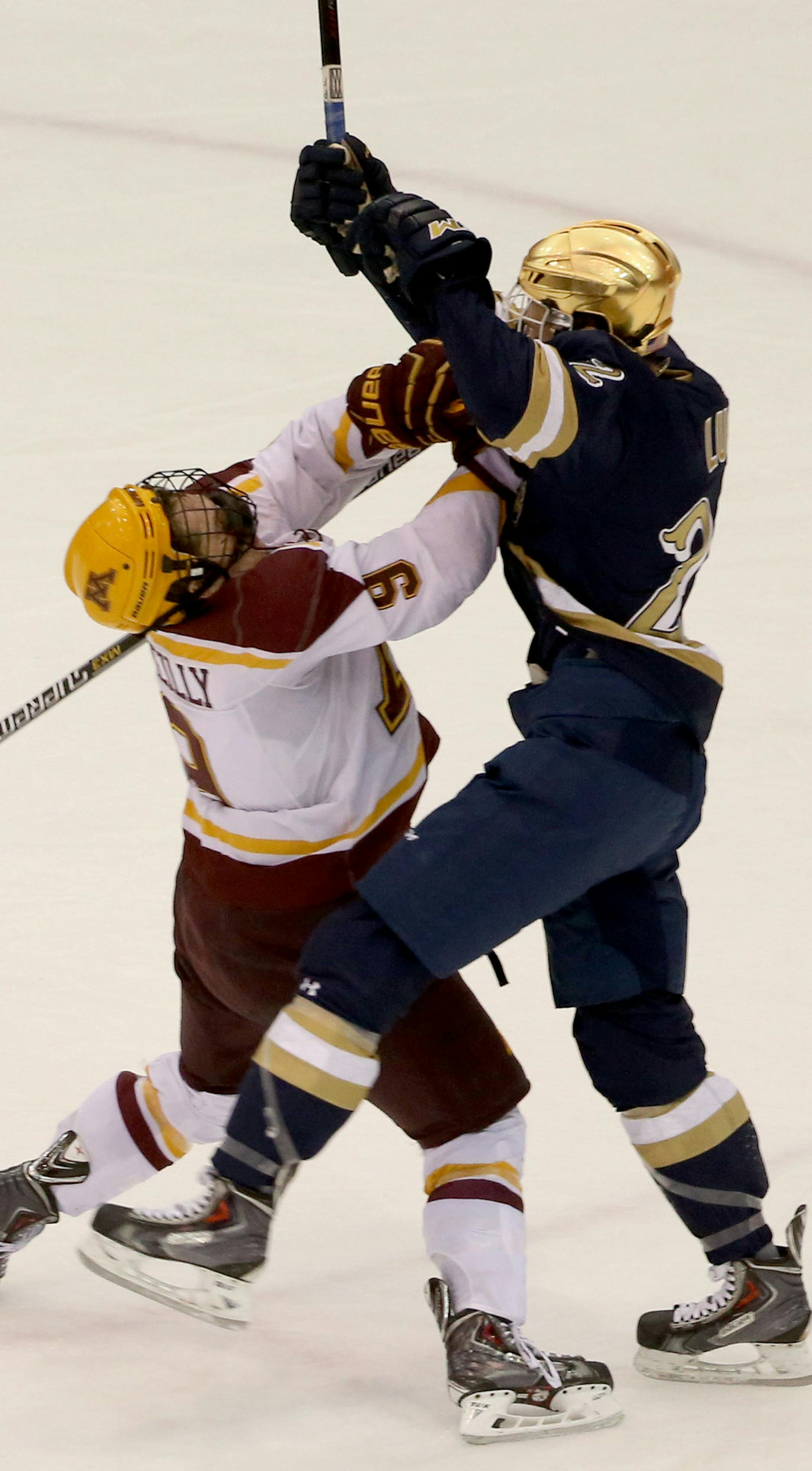 Gopher's Ryan Reilly and Notre Dame's Mario Lucia collided and Lucia got called for high sticking during the first period ] (KYNDELL HARKNESS/STAR TRIBUNE) kyndell.harkness@startribune.com Gopher men's hockey vs Notre Dame at Mariucci Arena at the University of Minnesota in Minneapolis, Min., Friday, November 7, 2014.