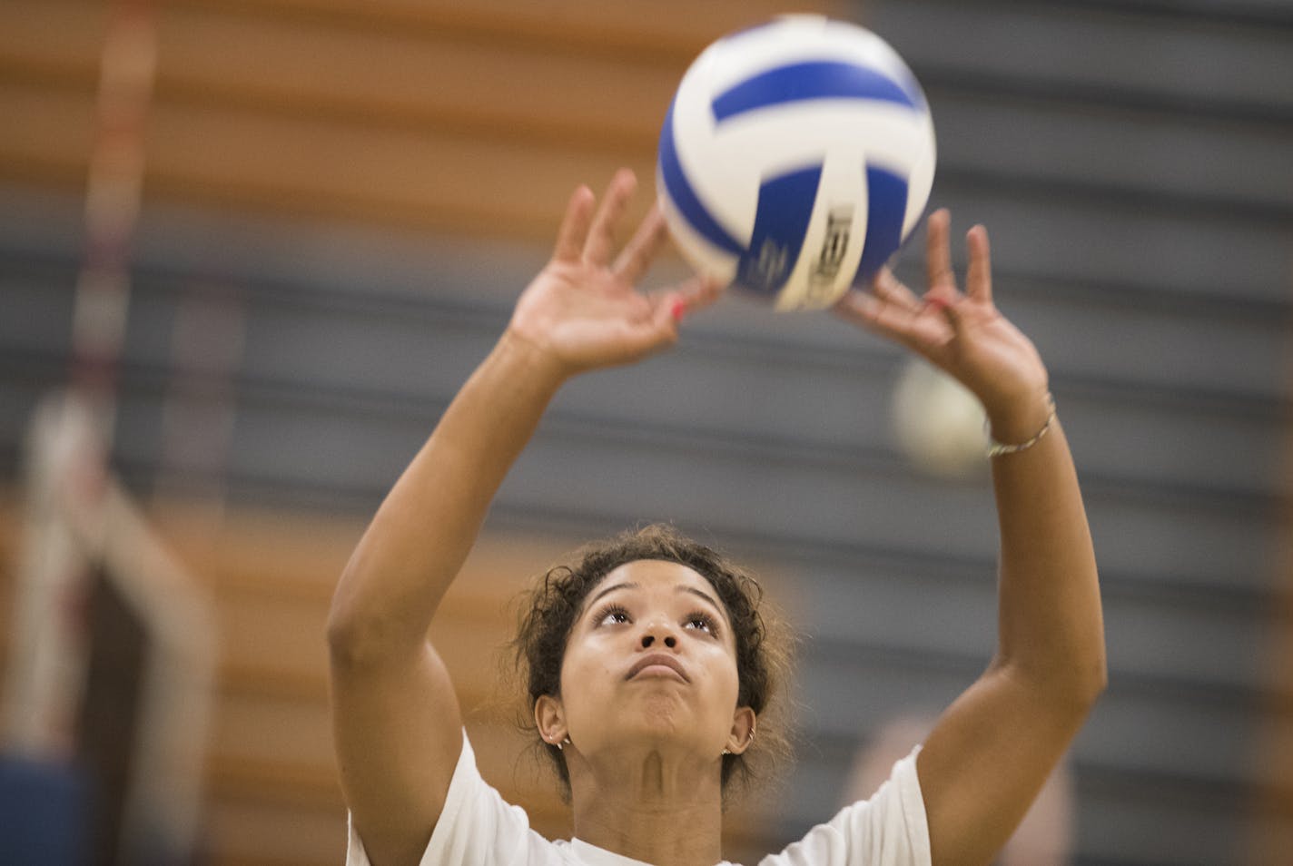 Senior Brie Orr sets the ball. ] (Leila Navidi/Star Tribune) leila.navidi@startribune.com BACKGROUND INFORMATION: Girls volleyball tryouts at Eagan High School in Eagan on Monday, August 15, 2016.