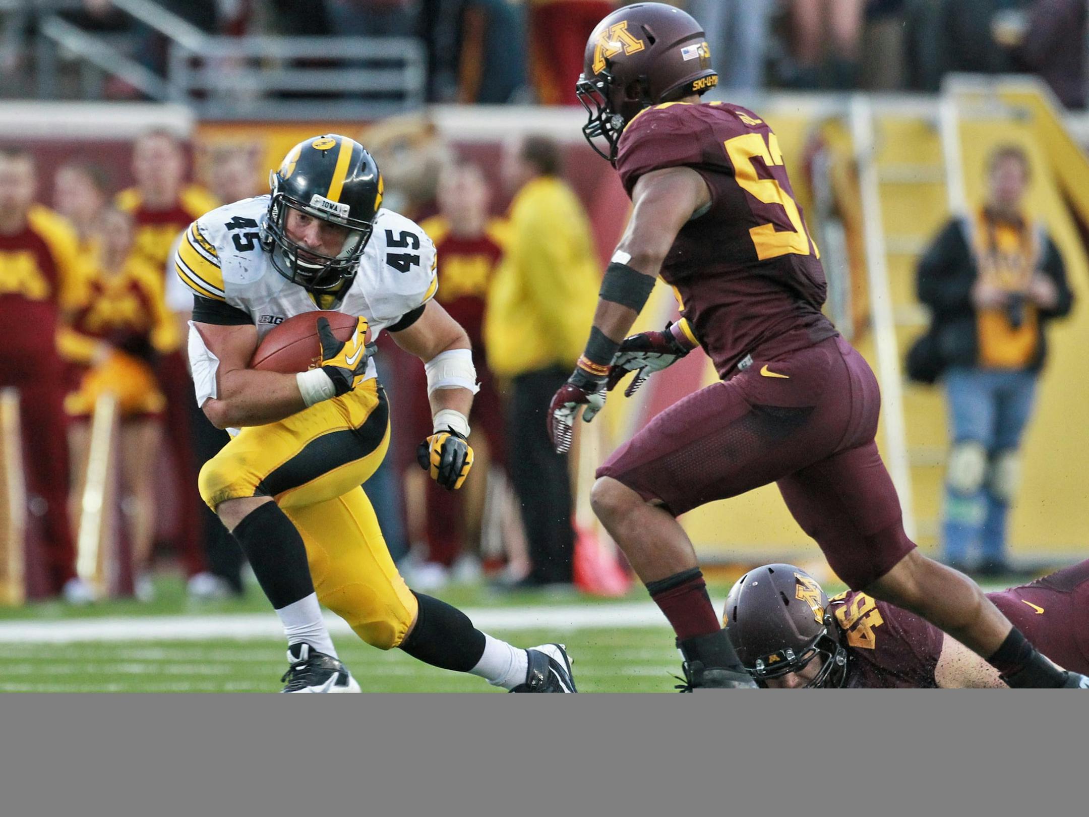 Iowa Hawkeyes va. Minnesota Gophers football. Iowa won 23-7. iowa running back Mark Weisman (45) picked up some of his rushing yards on a 2nd half carry. (MARLIN LEVISON/STARTRIBUNE(mlevison@startribune.com)