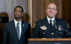 St. Paul Police Deputy Chief Jeremy Ellison, right, addressed the media Wednesday after he was introduced by Mayor Melvin Carter as interim chief of t