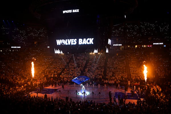 Flames shot up from the basket standards during player introductions before Game 6 between the Timberwolves and the Denver Nuggets Thursday night at T
