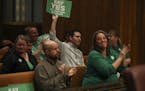 Supporters of the master plan to develop the Ford Plant site applauded after the St. Paul City Council voted to approve it 5-2.