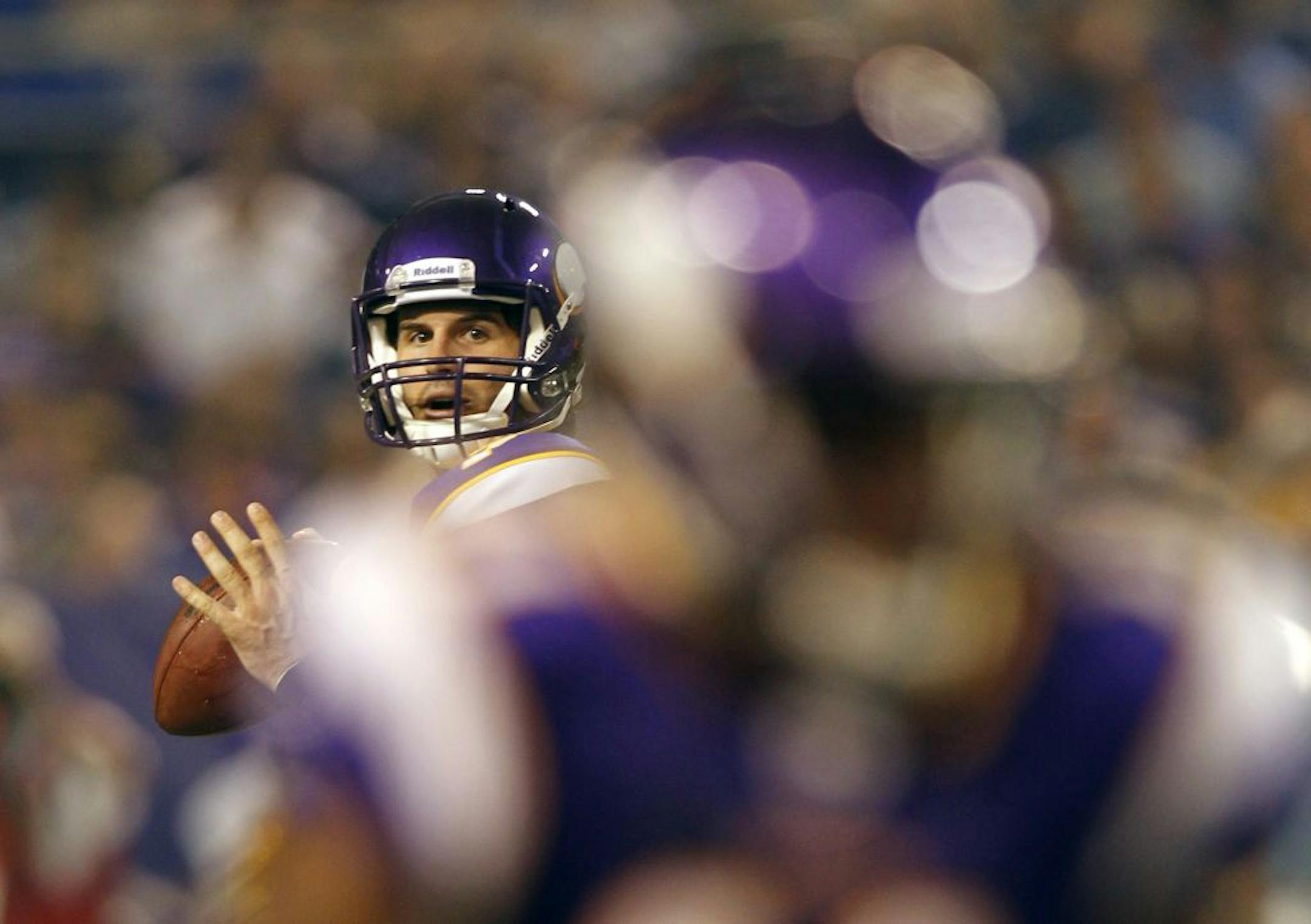 Minnesota Vikings quarterback Christian Ponder throws a pass during the first half of an NFL preseason football game against the Houston Texans Thursday, Sept. 1, 2011, in Minneapolis.