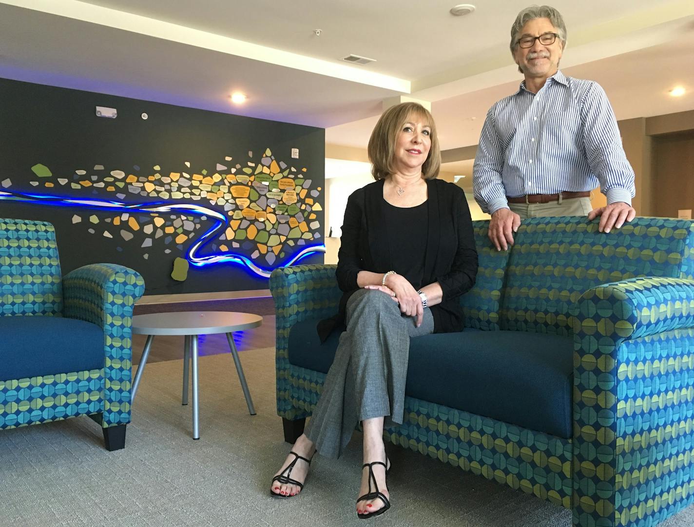 Linda Bialick, founder of J-HAP, and Executive Director Jeff Sherman in the lobby of the new building, which has 9-foot ceilings and floor-to-ceiling windows.