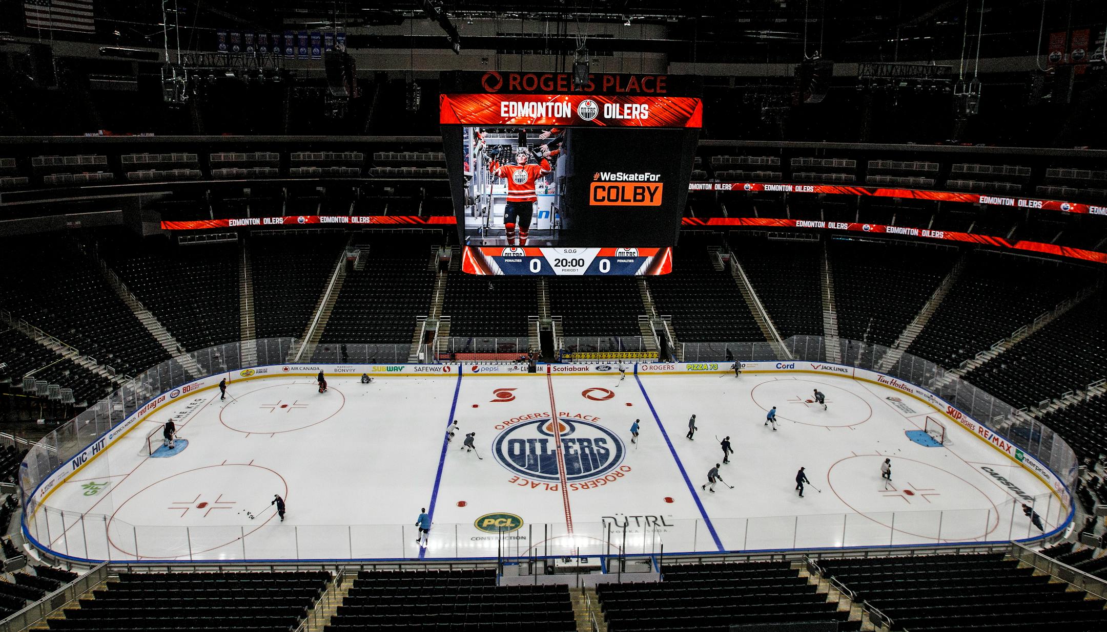 Oilers players take to the ice for hockey training camp in Edmonton on July 13