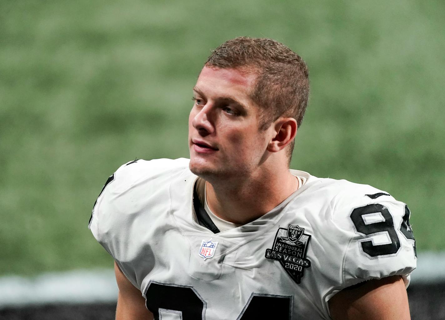 FILE - In this Nov. 29, 2020, file photo, Las Vegas Raiders defensive end Carl Nassib leaves the field after an NFL football game against the Atlanta Falcons in Atlanta. Nassib on Monday, June 21, 2021, became the first active NFL player to come out as gay. Nassib announced the news on Instagram, saying he was not doing it for the attention but because "I just think that representation and visibility are so important." (AP Photo/John Bazemore, File)