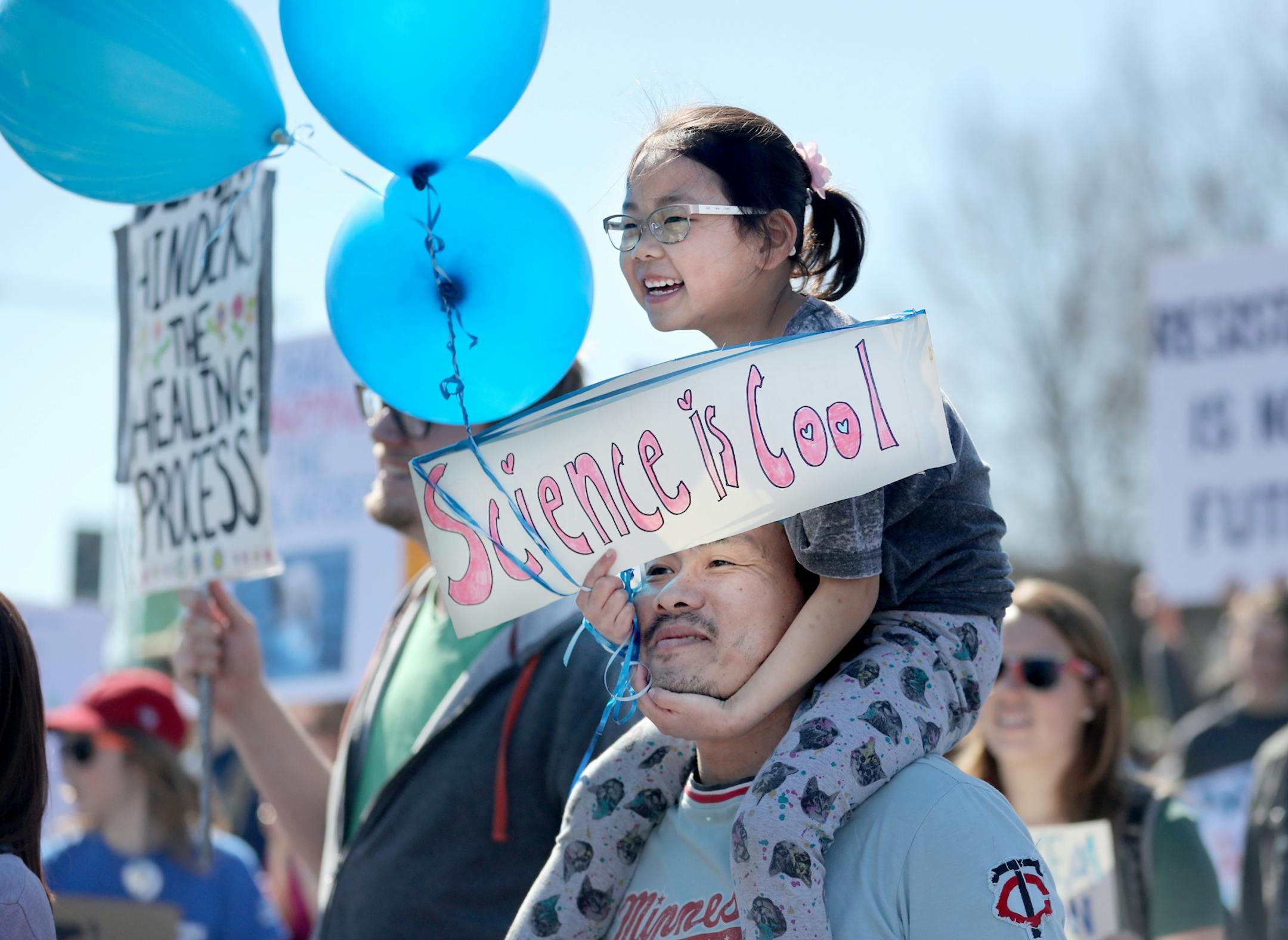 March for Science moved from the start at Cathedral Hill Park to State Capitol, with an estimated 10,000 or more joining to champion the role of science in American life. Here, Scout Riley, 6, and her dad Brandon Riley of Eagan were among a crowd of thousands participating in the March for Science as they made their way to the State Capitol Mall Saturday, April 22, 2017, in St. Paul, MN.