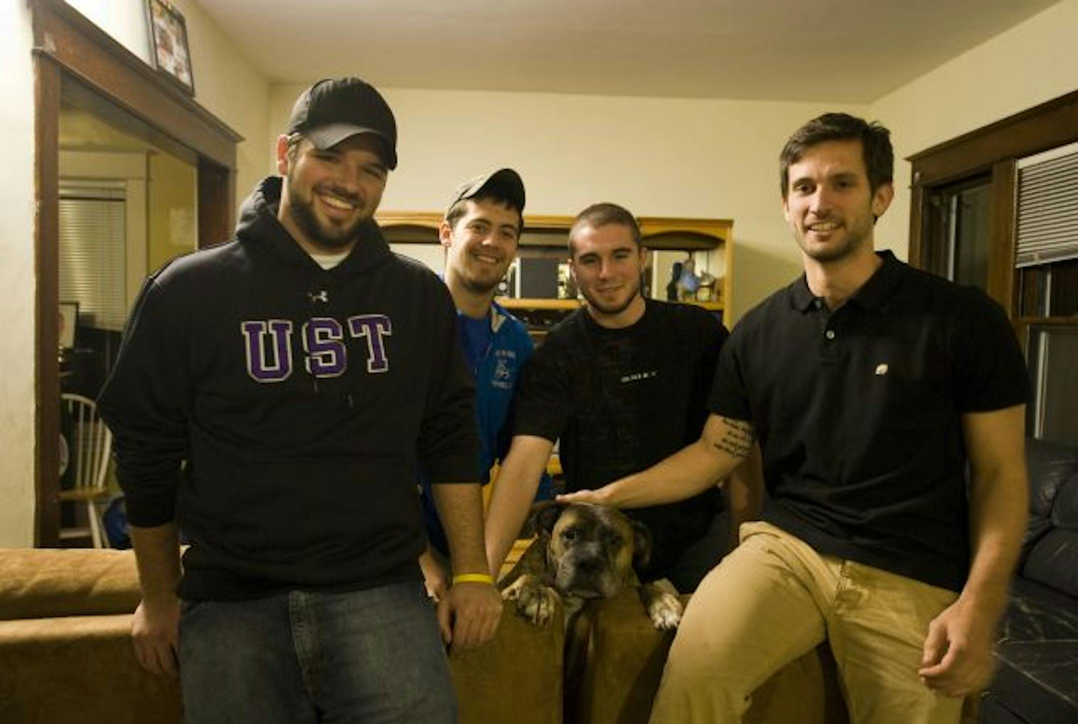 Rugby players and St.Thomas students living near campus on Marshall Ave. in St.Paul are (L. to R.) Brian Salzer, Tom Maher, Sam Glynn, and Ross Alberts.