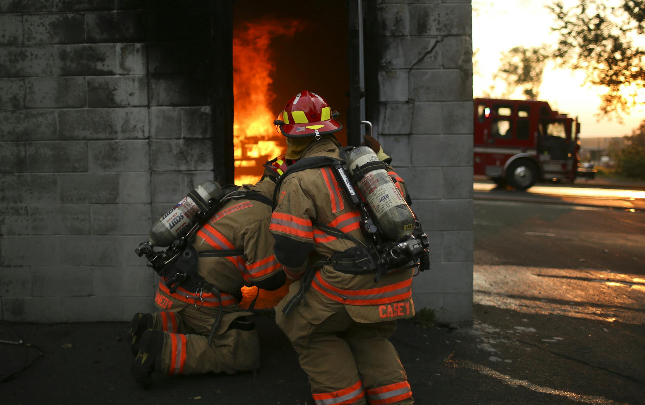 The ABLE Fire Training Facility in Burnsville, built in 1988, is showing its age. The four cities who use it, Apple Valley, Burnsville, Lakeville, Eagan have each kicked in $500K to replace it with a more up to date facility. Apple Valley firefighters received live fire training there Monday night, August 13, 2012 at. Apple Valley Captains David Kennedy, left, and Steve Casey checked on a fire that a crew entering the training facility from the other side would be fighting in a few moments ] JEF