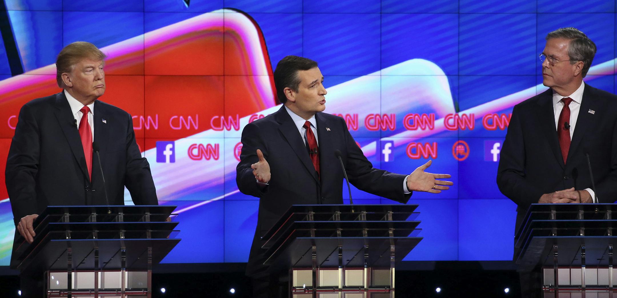 Sen. Ted Cruz of Texas speaks during the debate of Republican presidential hopefuls at the Venetian in Las Vegas, Dec. 15, 2015. From left: Donald Trump, Cruz and Jeb Bush. (Ruth Fremson/The New York Times) ORG XMIT: MIN2015121615093739