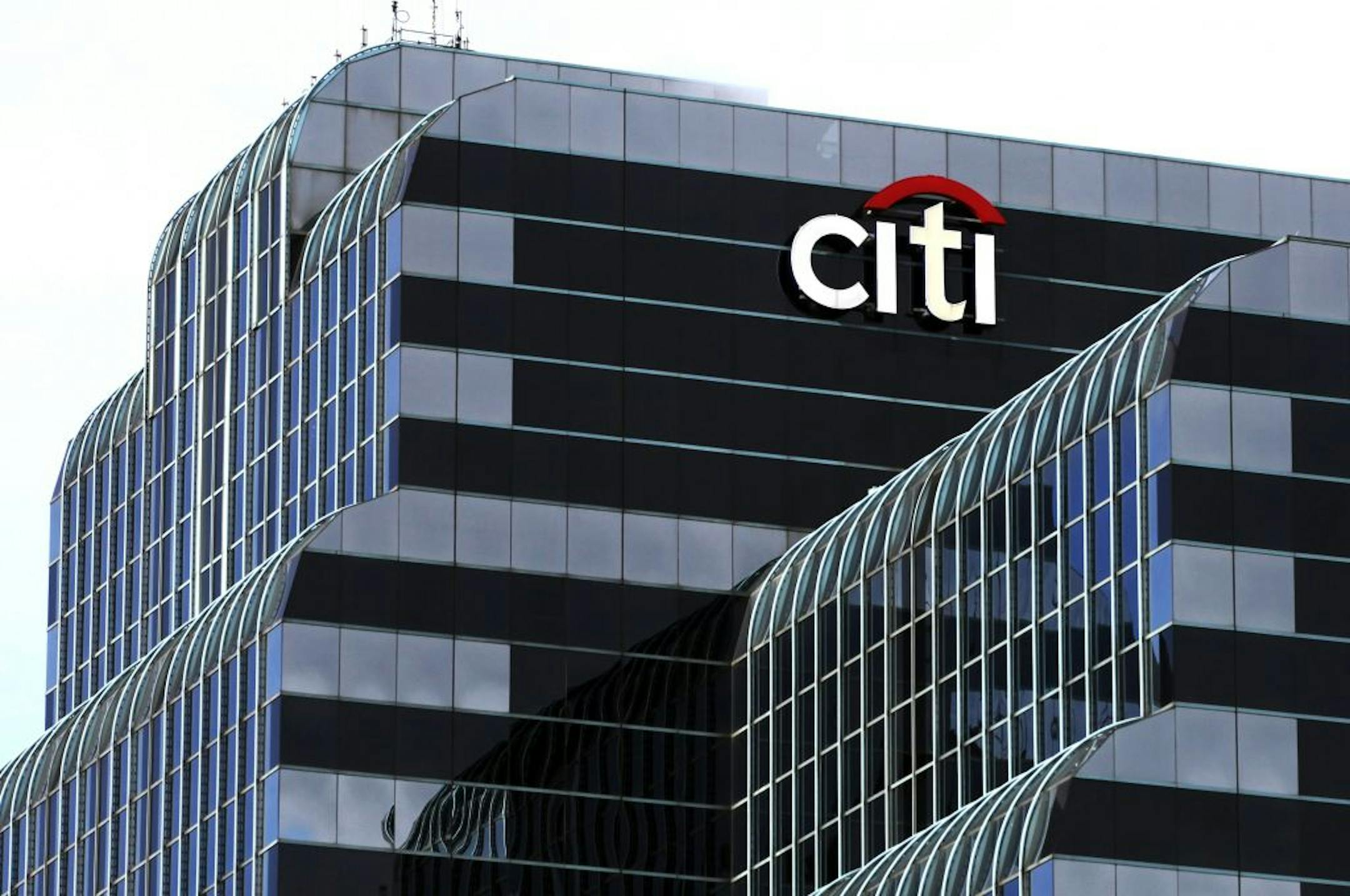 Citi Bank sign is seen, Wednesday, Dec. 5, 2012 in Chicago. Citigroup said Wednesday that it will cut 11,000 jobs, a bold early move by new CEO Michael Corbat. The cuts amount to about 4 percent of Citi's workforce of 262,000.
