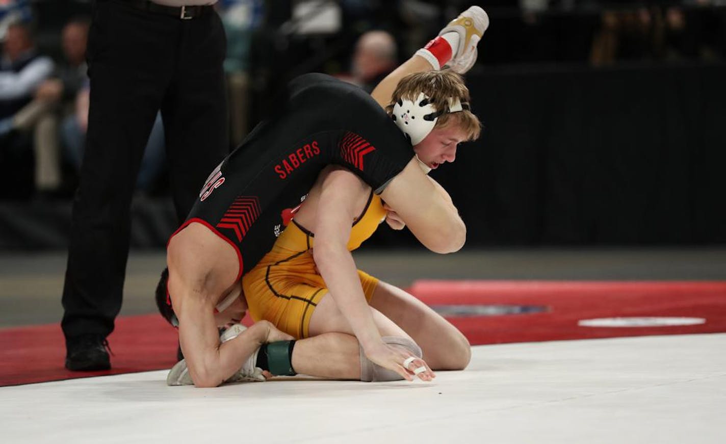 Derrick Cardinal of Forest Lake upended Ben Lunn of Shakopee in their Class 3A 120-pound match, which Cardinal won, in the 2019 wrestling state meet. Both are back in this year's state tournament