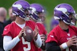 Vikings rookie J.J. McCarthy (9) throws with his fellow quarterbacks during organized team activities last week. At minicamp this week, he might get t